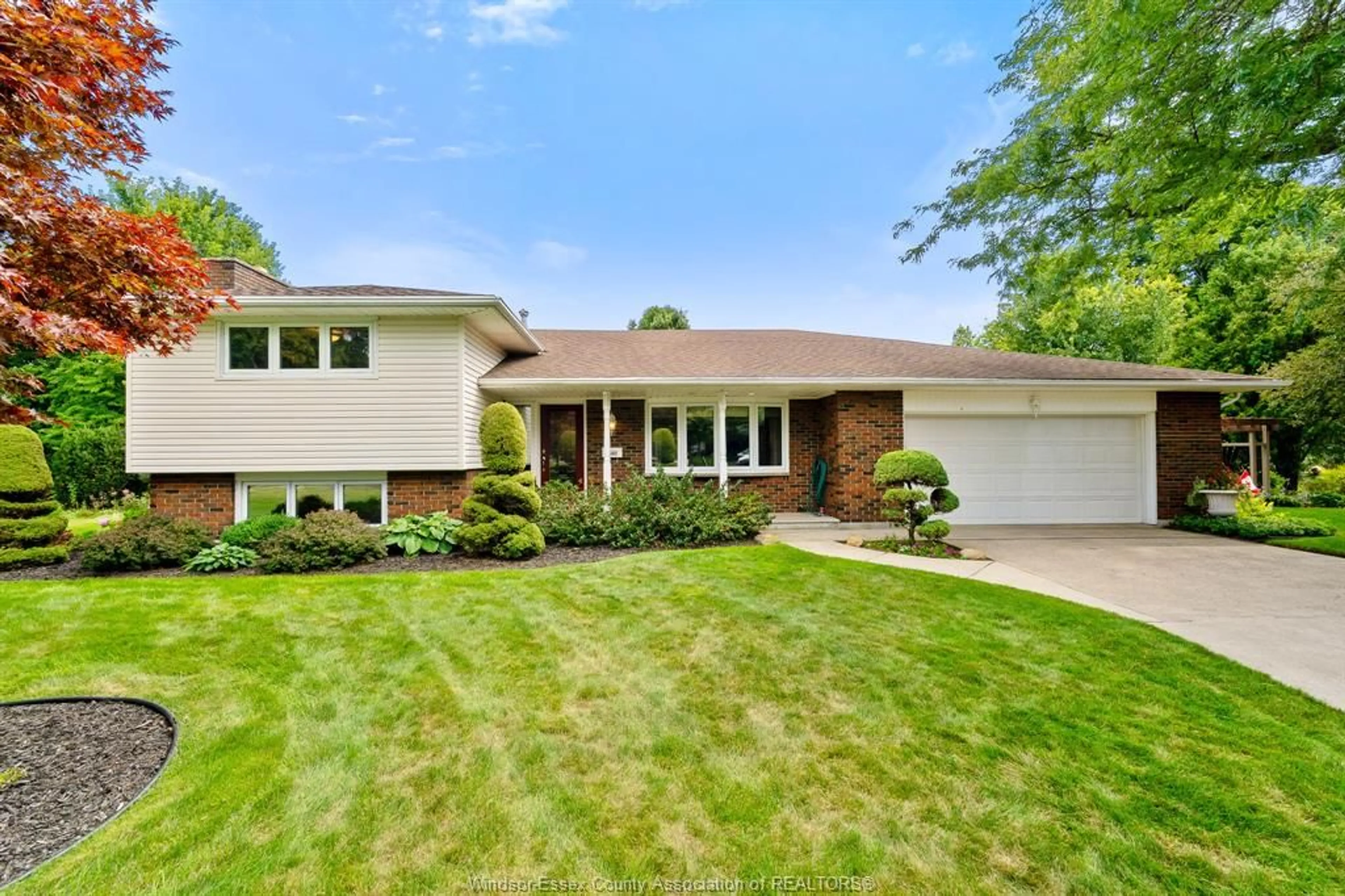 Home with brick exterior material, street for 1502 Bayfield Cres, Kingsville Ontario N9Y 2X7