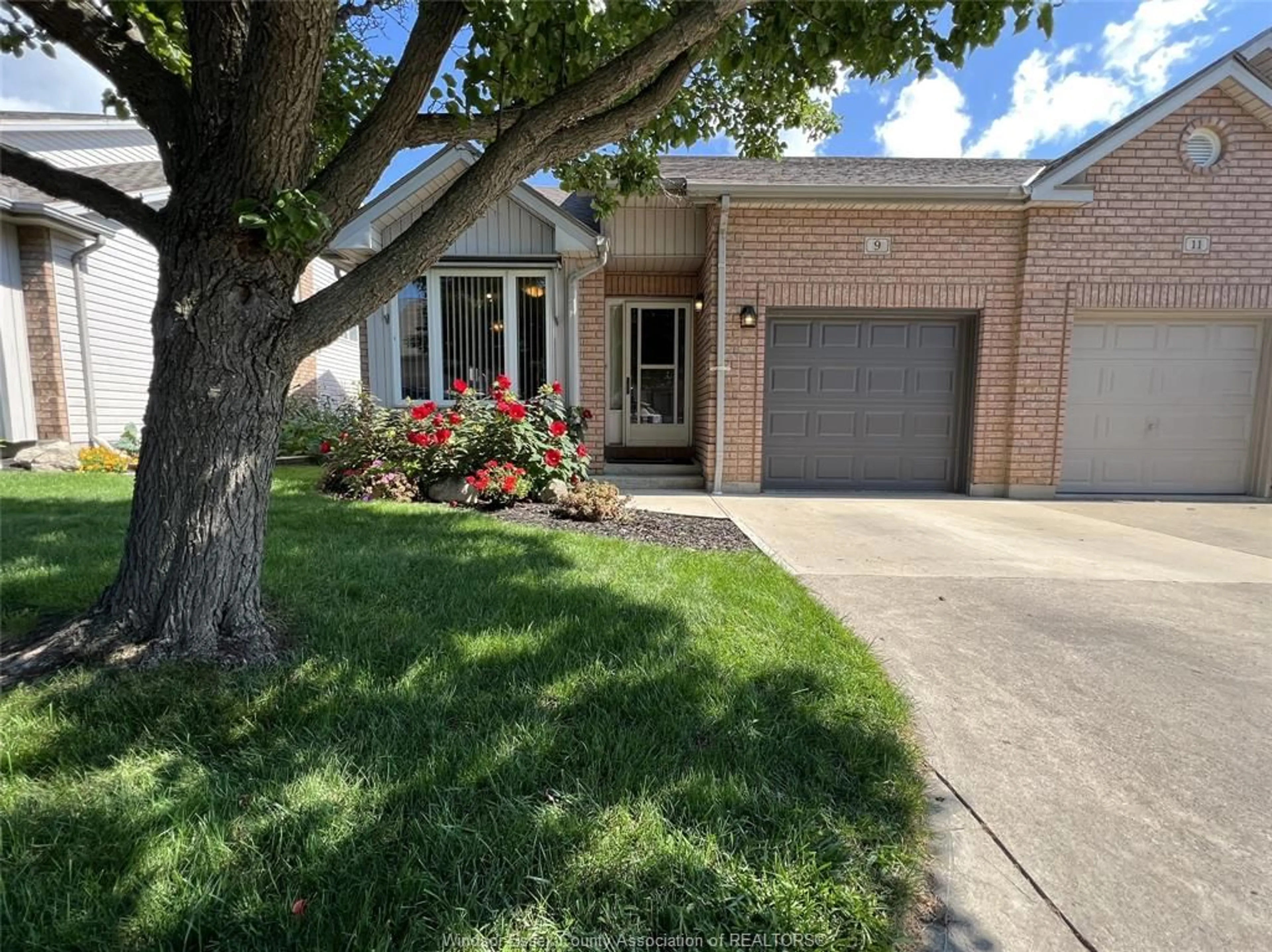 Home with brick exterior material, street for 9 Erie Glen Cres, Leamington Ontario N8H 5K2