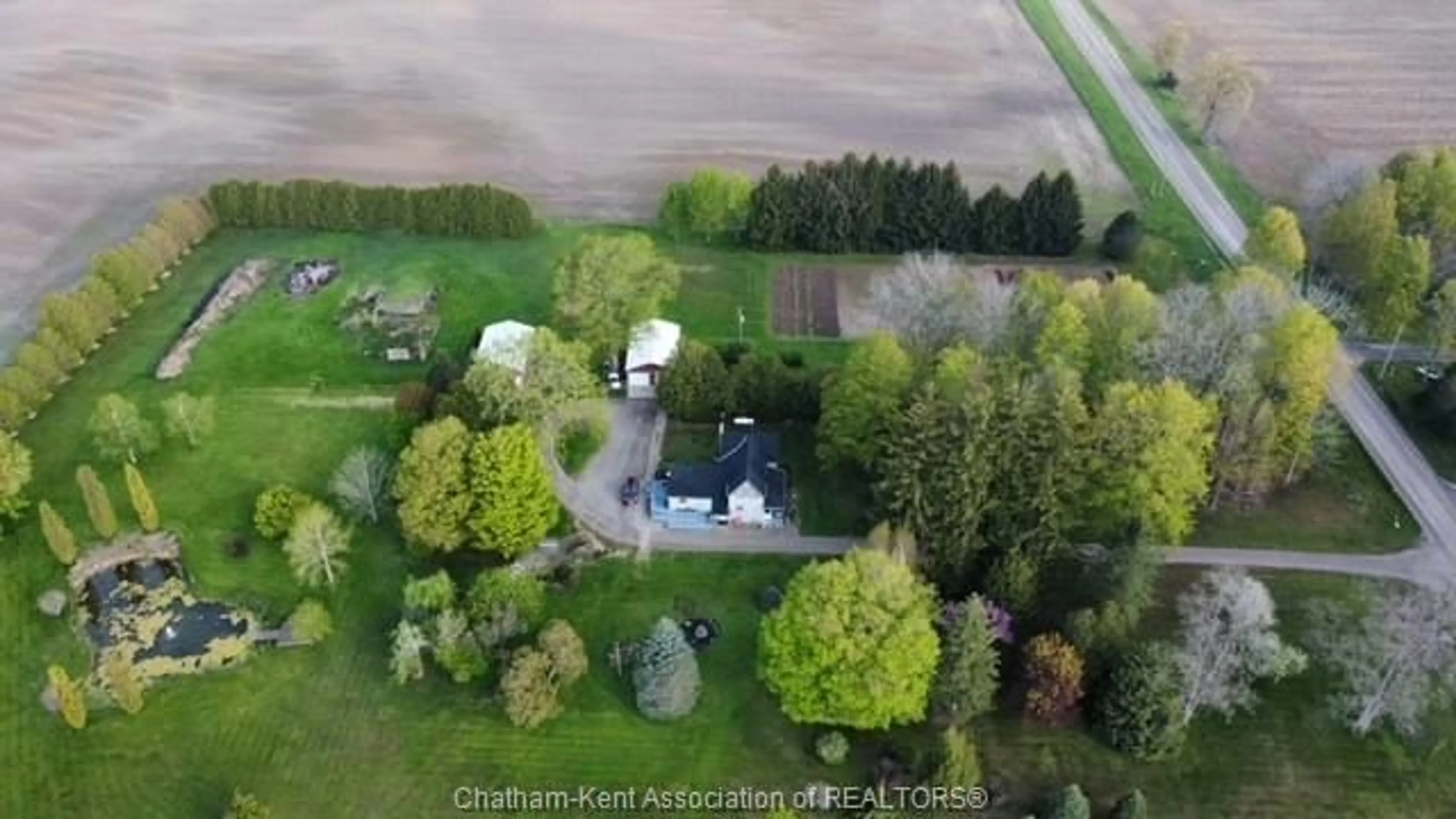 A pic from outside/outdoor area/front of a property/back of a property/a pic from drone, street for 22054 KNOLL Rd, Orford Township Ontario N0P 2K0