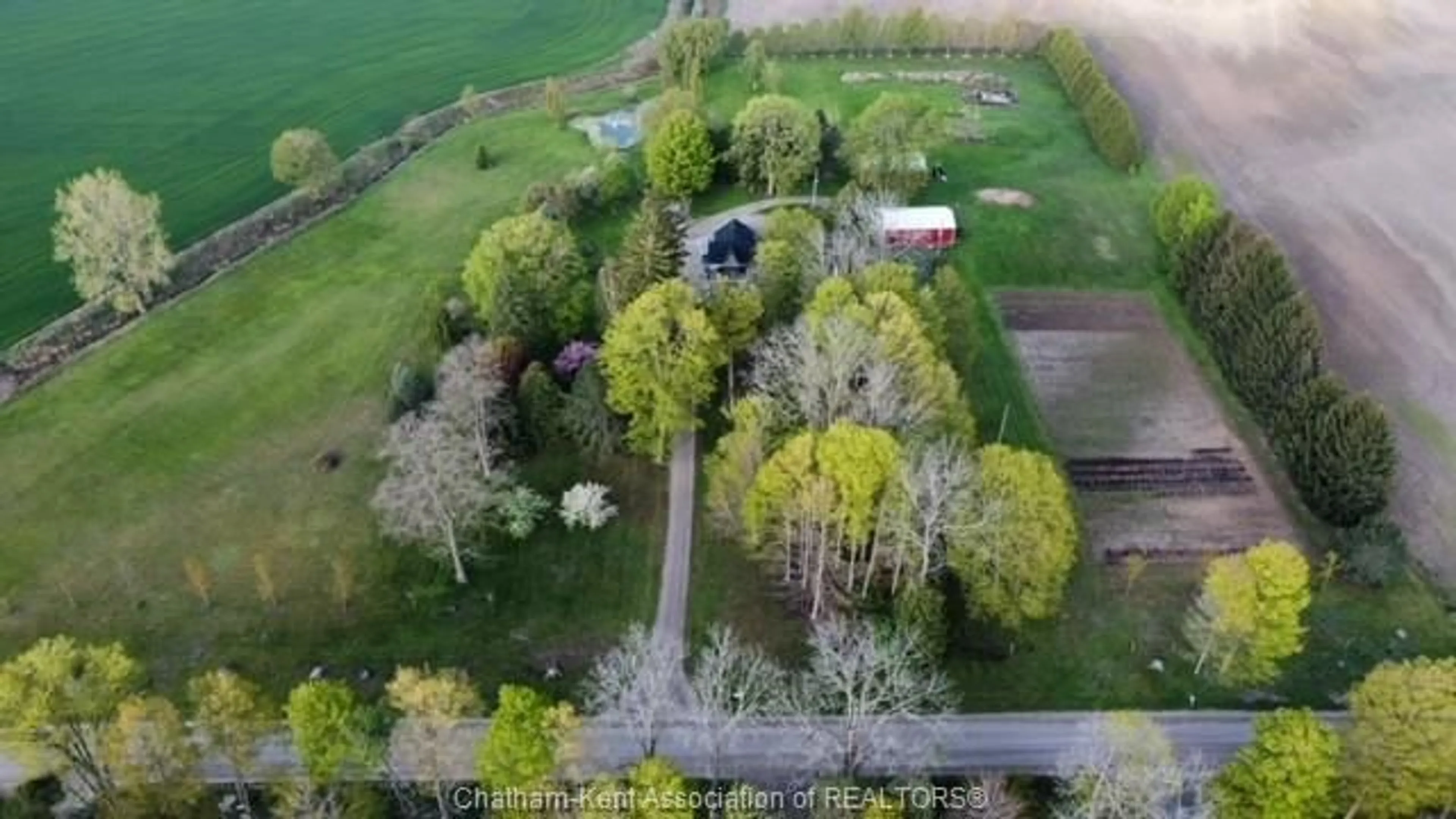 A pic from outside/outdoor area/front of a property/back of a property/a pic from drone, unknown for 22054 KNOLL Rd, Orford Township Ontario N0P 2K0
