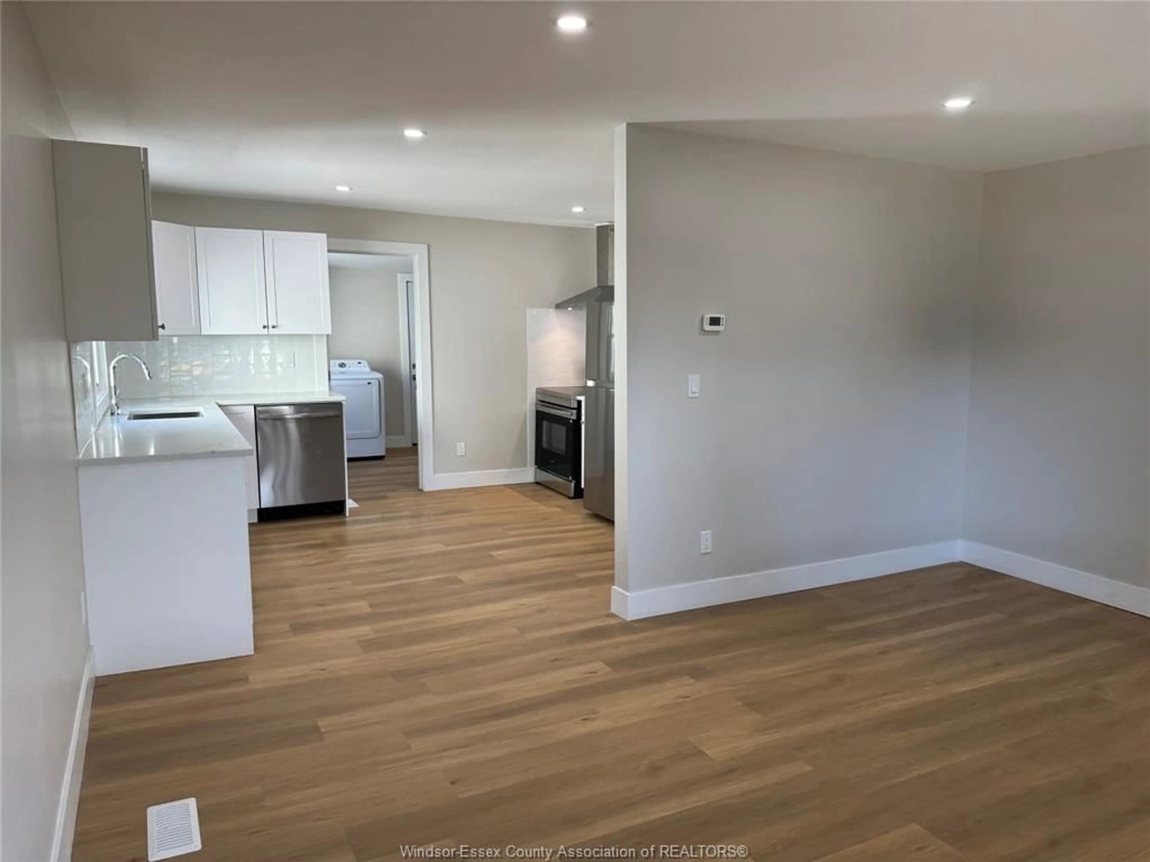 Open concept kitchen, wood/laminate floor for 1462 Labadie, Windsor Ontario N8Y 4H1