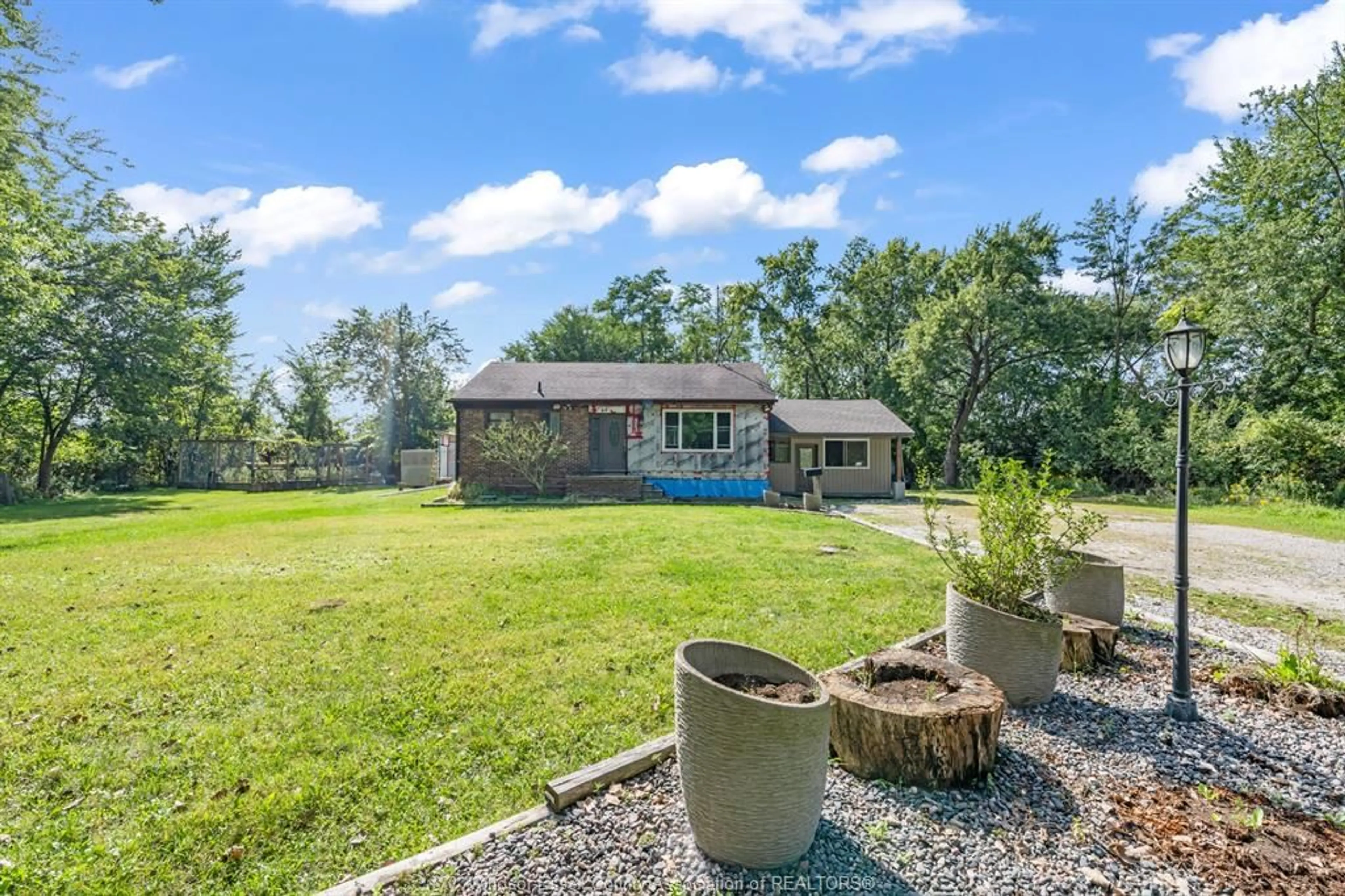 A pic from outside/outdoor area/front of a property/back of a property/a pic from drone, water/lake/river/ocean view for 2125 Betts, Windsor Ontario N9B 3P5