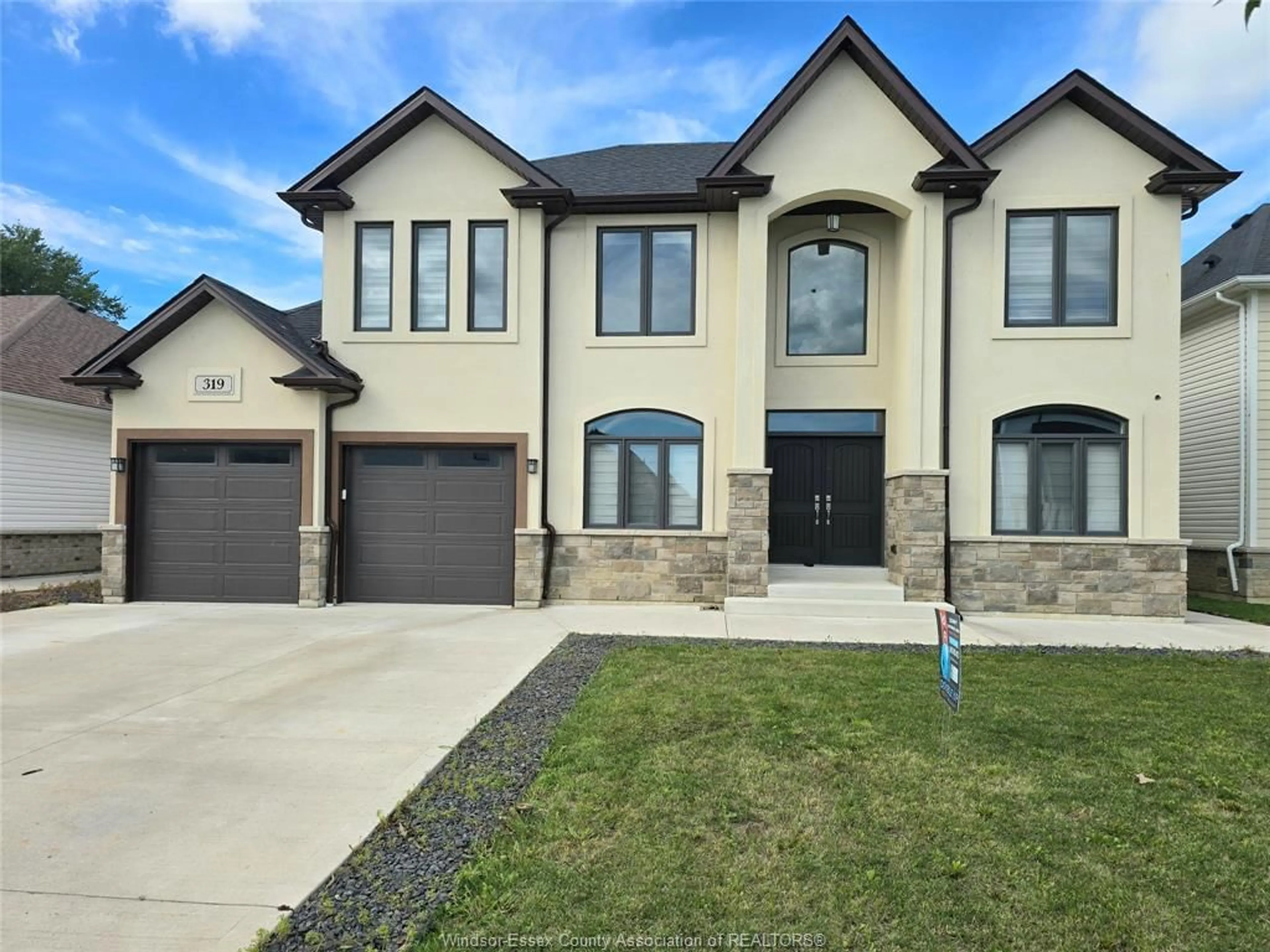 Home with brick exterior material, street for 319 CHRISTINE Ave, Belle River Ontario N8L 1B5