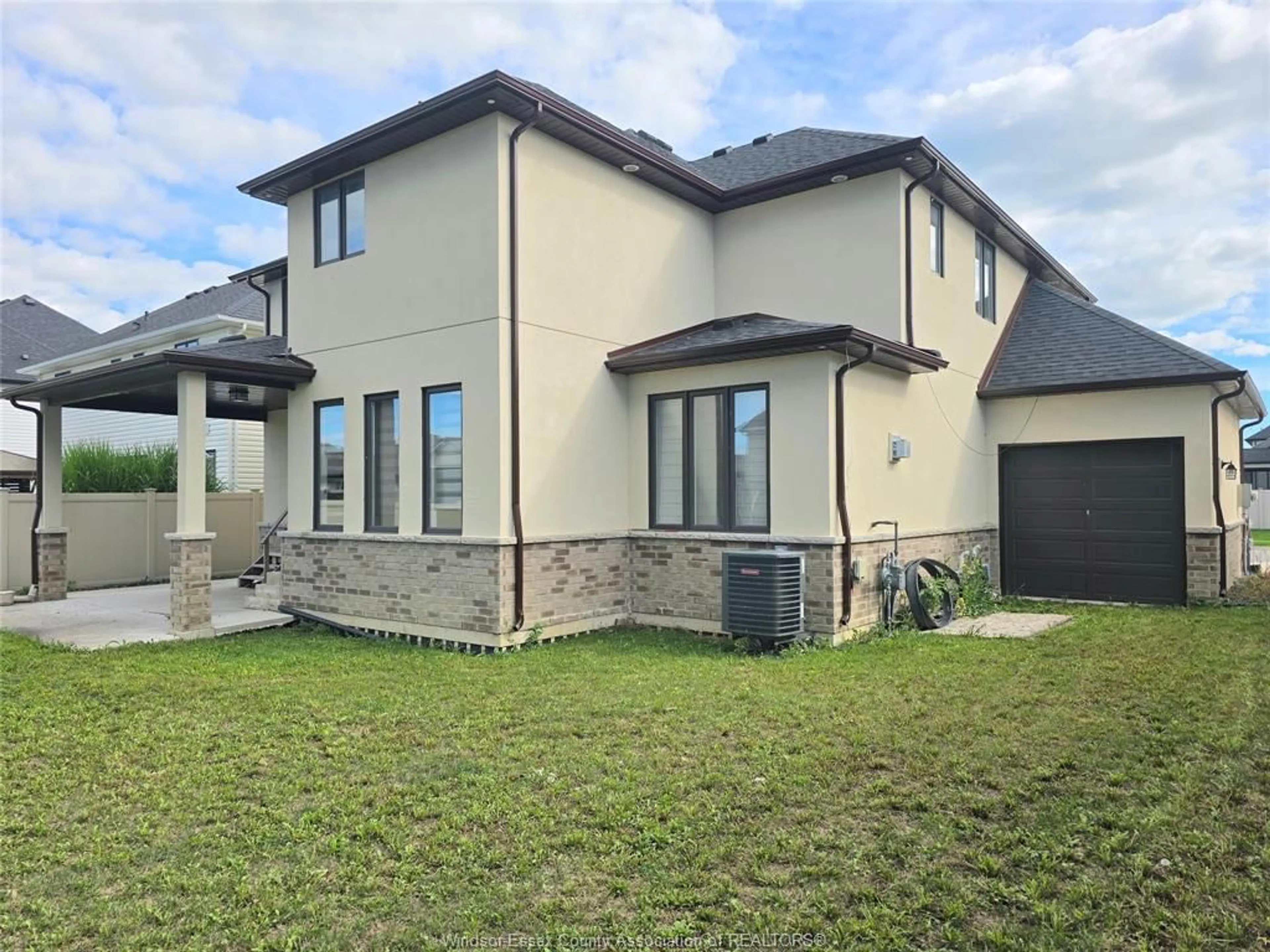 Home with brick exterior material, street for 319 CHRISTINE Ave, Belle River Ontario N8L 1B5