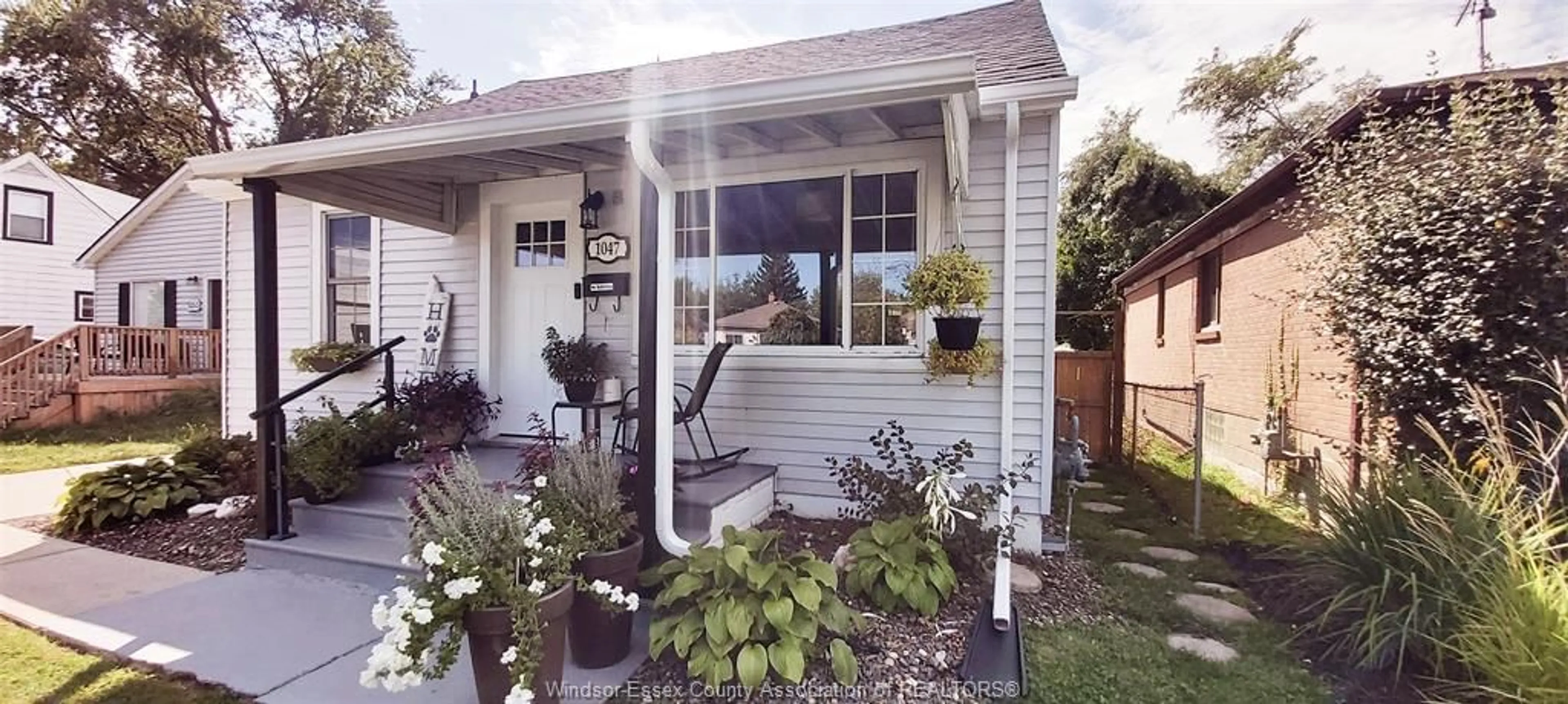 Home with vinyl exterior material, street for 1047 ESDRAS Ave, Windsor Ontario N8S 2N1
