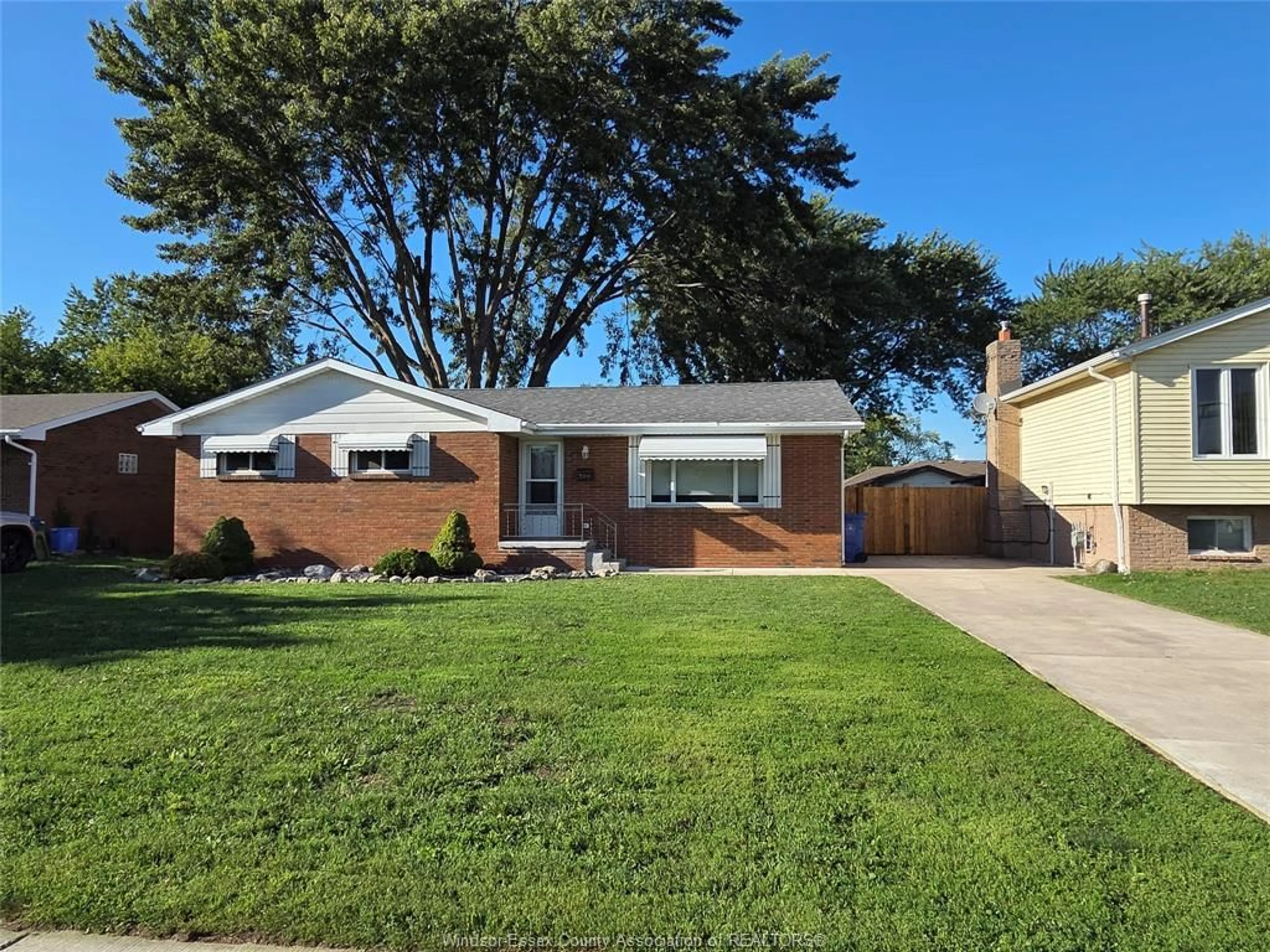 Home with brick exterior material, street for 399 ST. PETER St, Lakeshore Ontario N8L 0N3