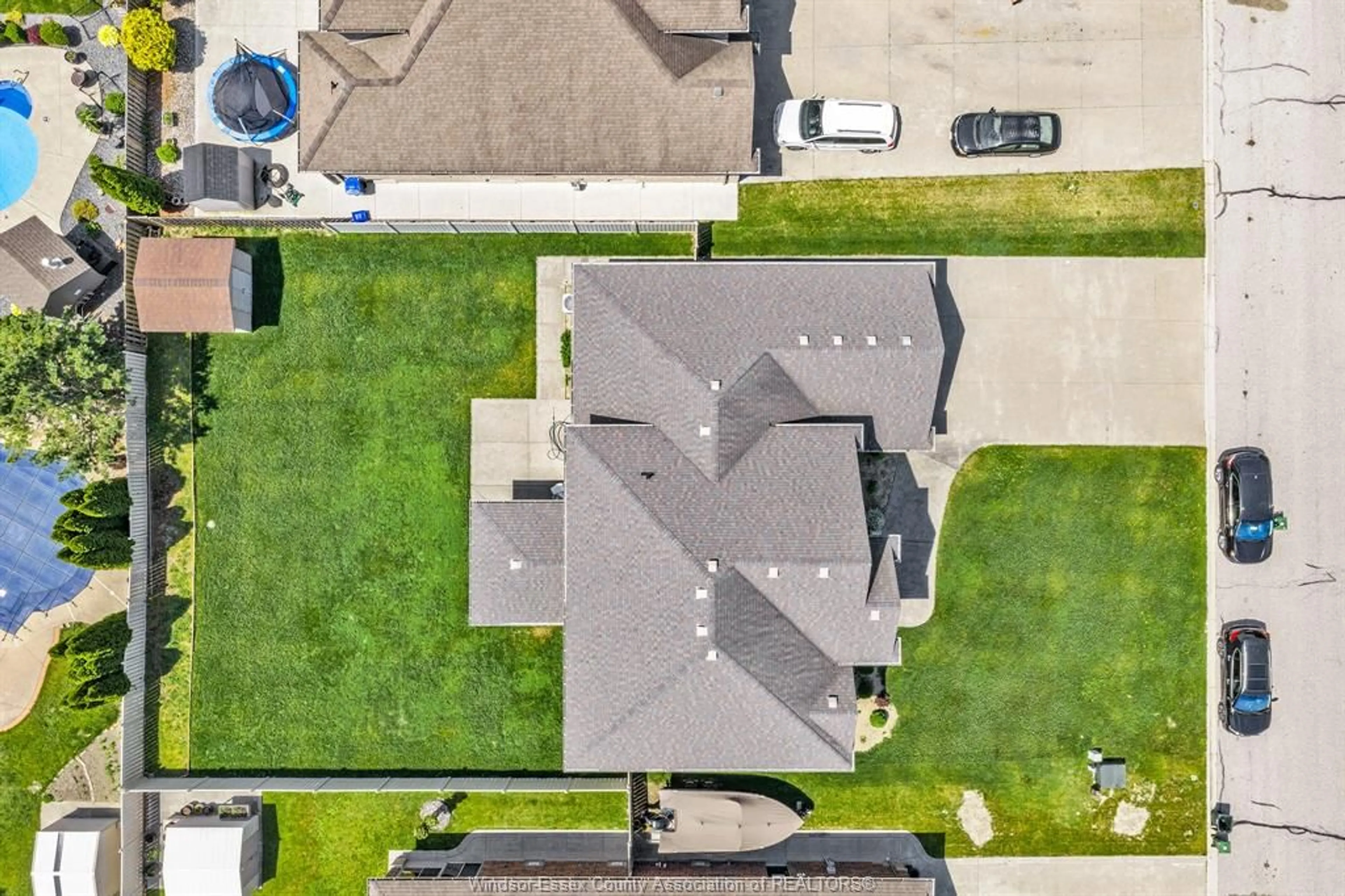 A pic from outside/outdoor area/front of a property/back of a property/a pic from drone, street for 1049 HUNTINGTON Blvd, Lakeshore Ontario N0R 1A0