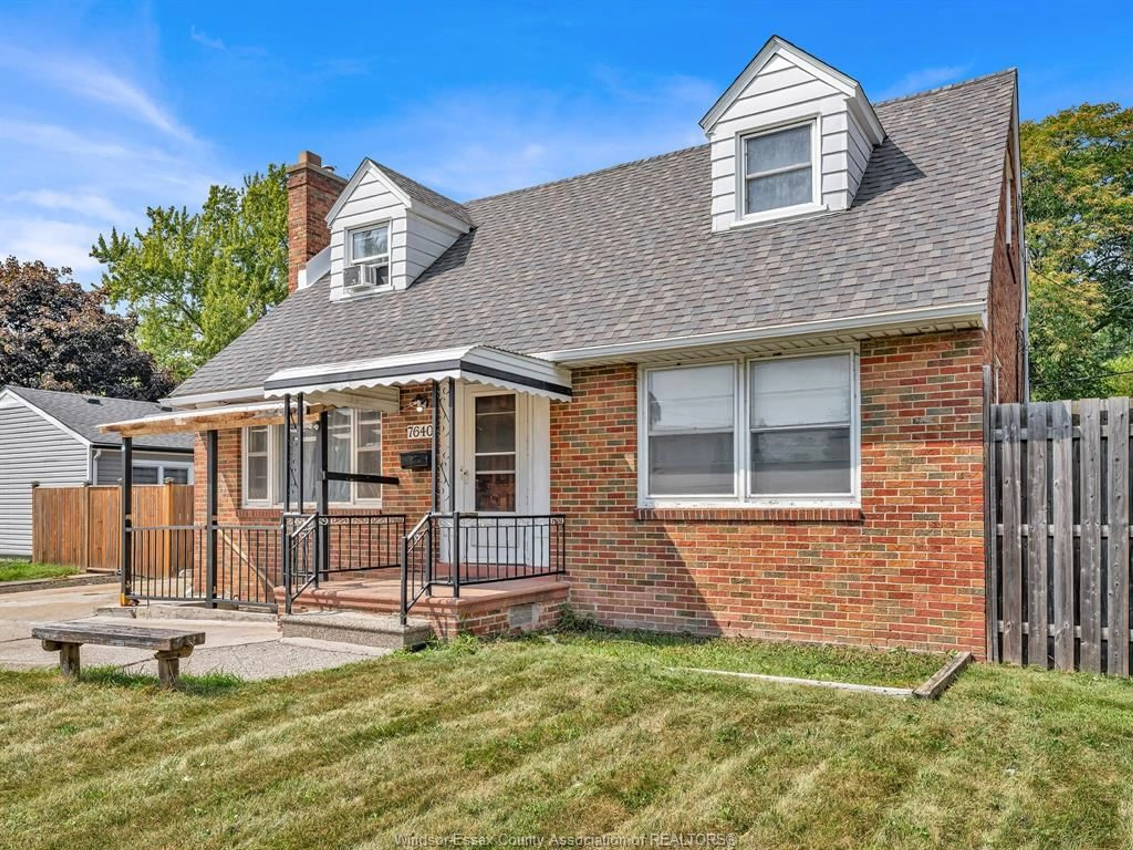 Home with brick exterior material, street for 7640 WYANDOTTE St, Windsor Ontario N8S 1S5