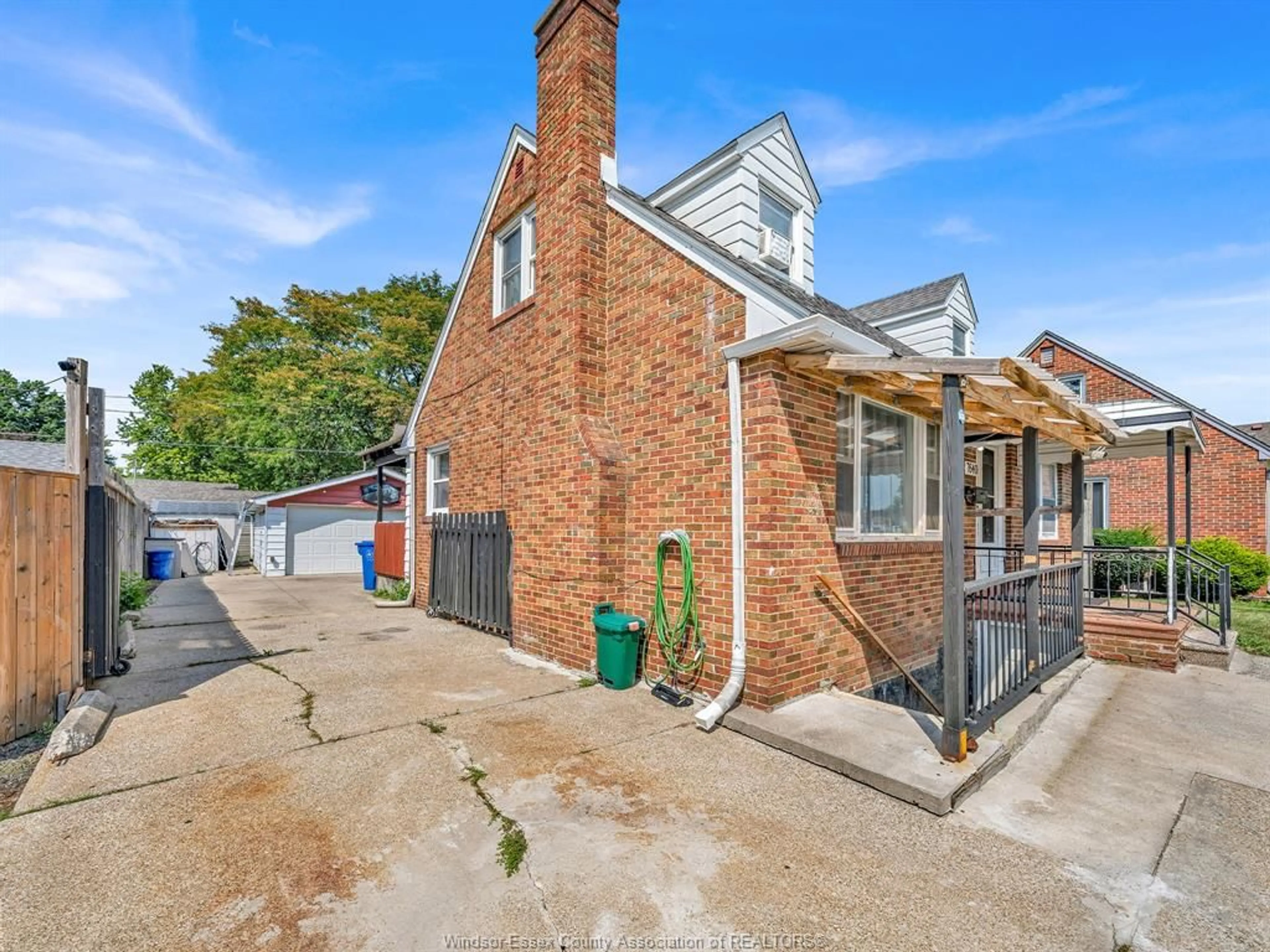 A pic from outside/outdoor area/front of a property/back of a property/a pic from drone, street for 7640 WYANDOTTE St, Windsor Ontario N8S 1S5