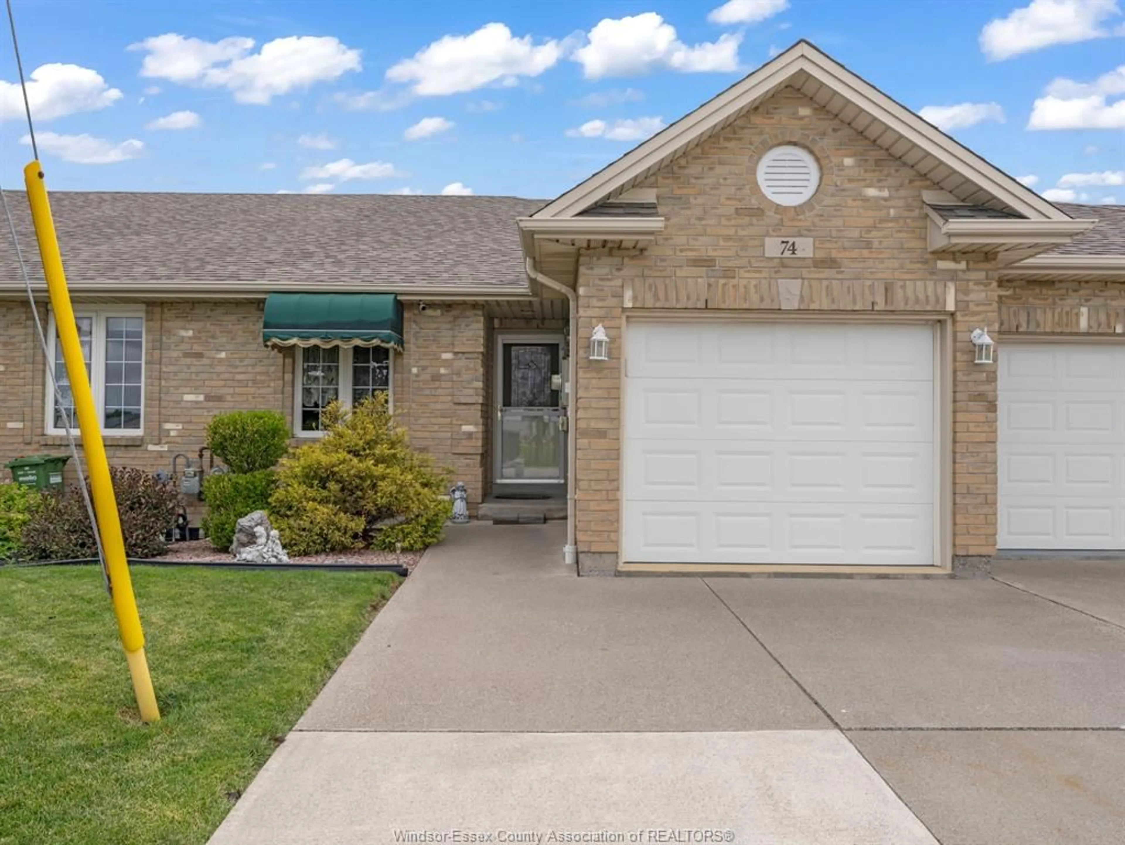 Home with brick exterior material, street for 74 GOSFIELD TOWNLINE, Essex Ontario N8M 1Y7