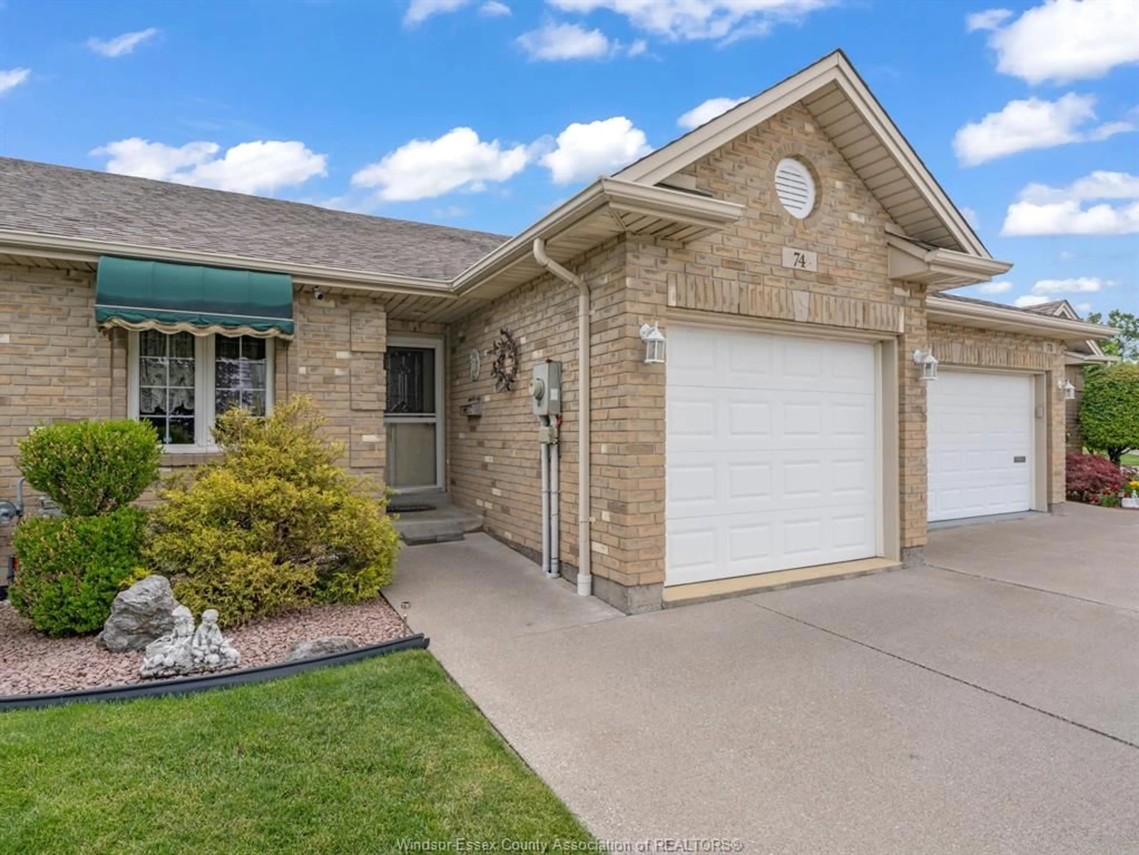 Home with brick exterior material, street for 74 GOSFIELD TOWNLINE, Essex Ontario N8M 1Y7