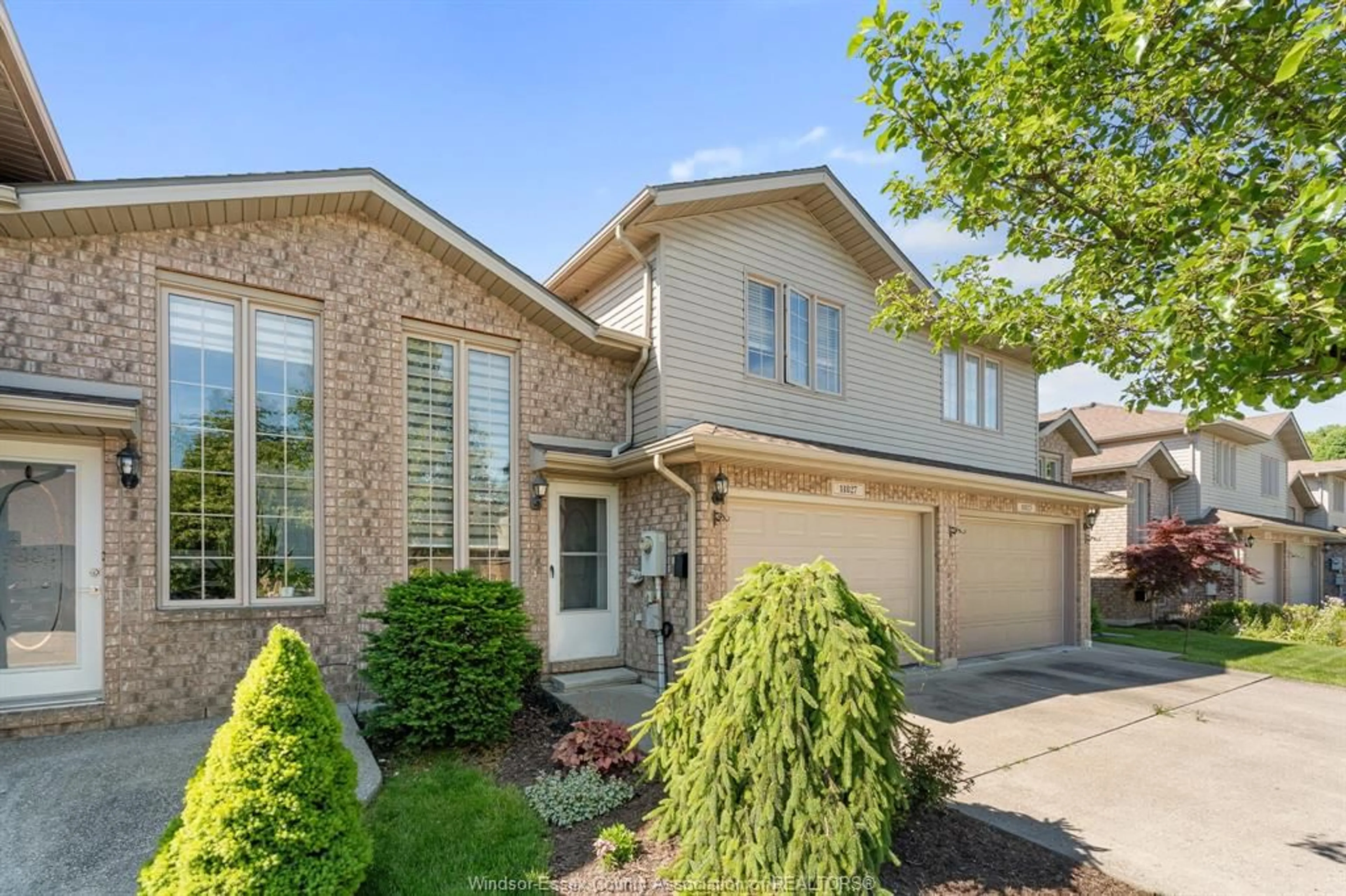 Home with brick exterior material, street for 11827 BOULDER Cres, Windsor Ontario N8P 1Z8