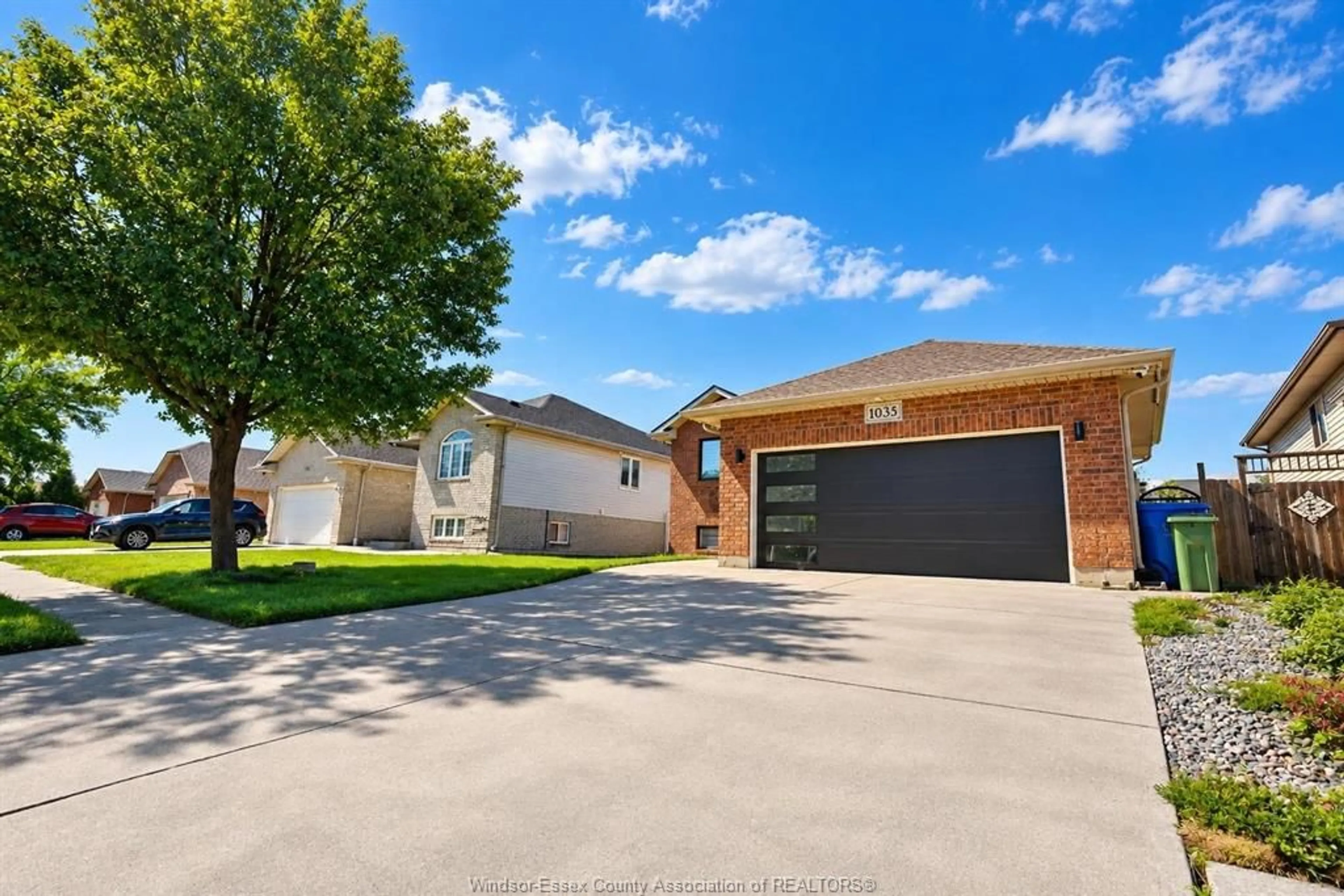 Home with brick exterior material, street for 1035 TREVERTON Cres, Windsor Ontario N8P 1K2
