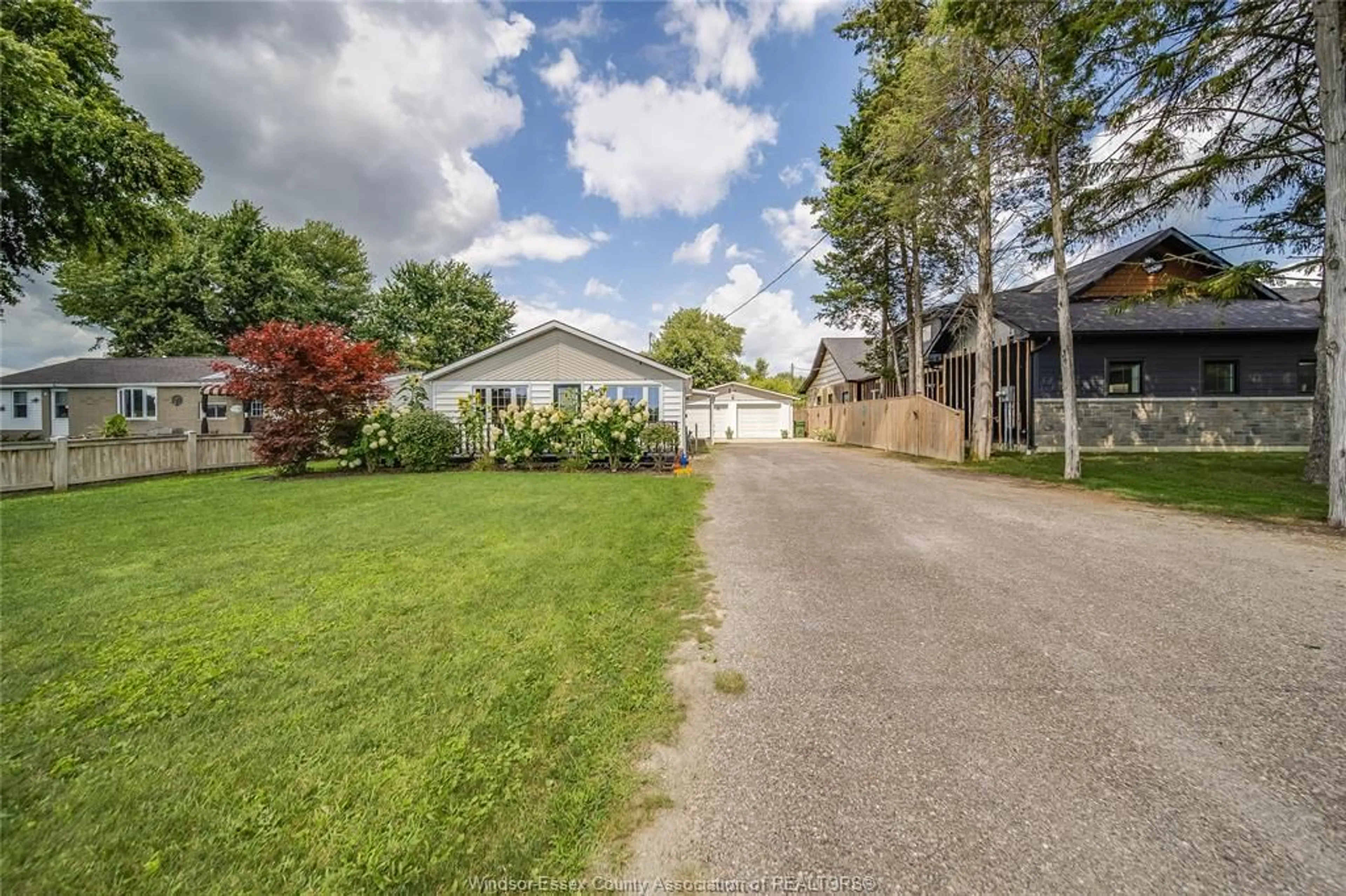 A pic from outside/outdoor area/front of a property/back of a property/a pic from drone, street for 74 ROAD 3, Kingsville Ontario N9Y 3A2
