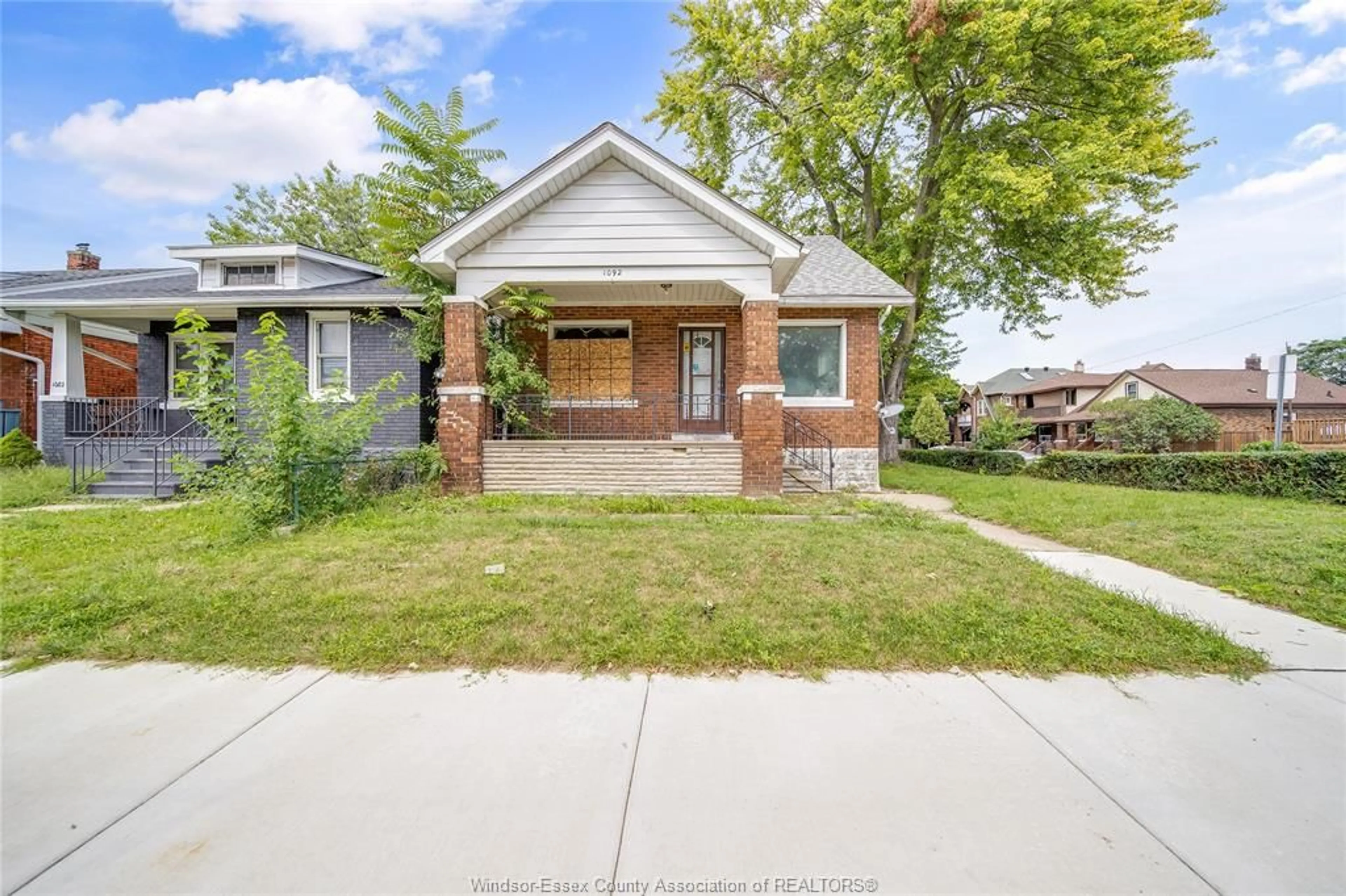Home with brick exterior material, street for 1092 ELLIS St, Windsor Ontario N8X 2J1