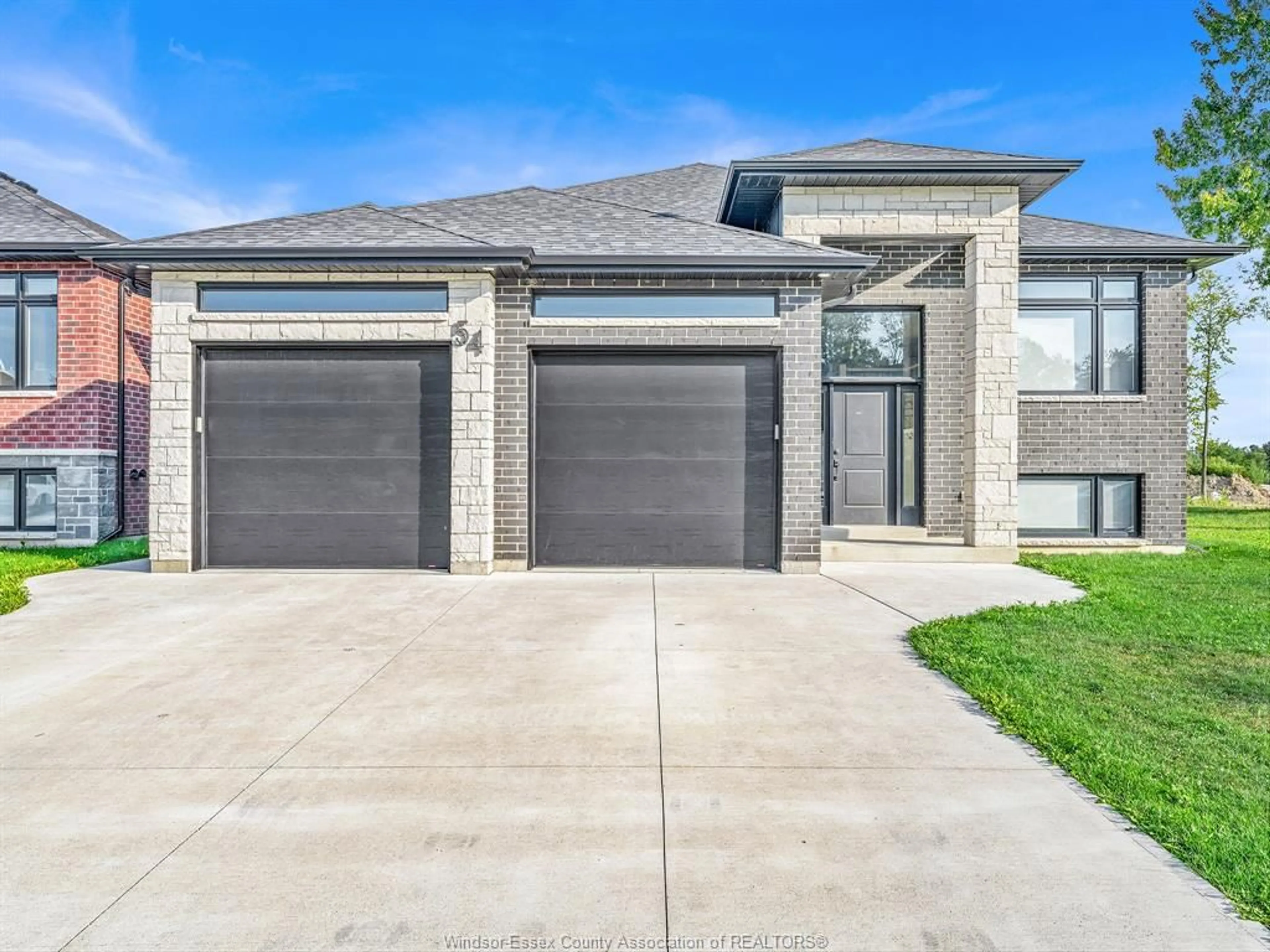 Home with brick exterior material, street for 54 REDWOOD A, B, Cottam Ontario N0R 1B0
