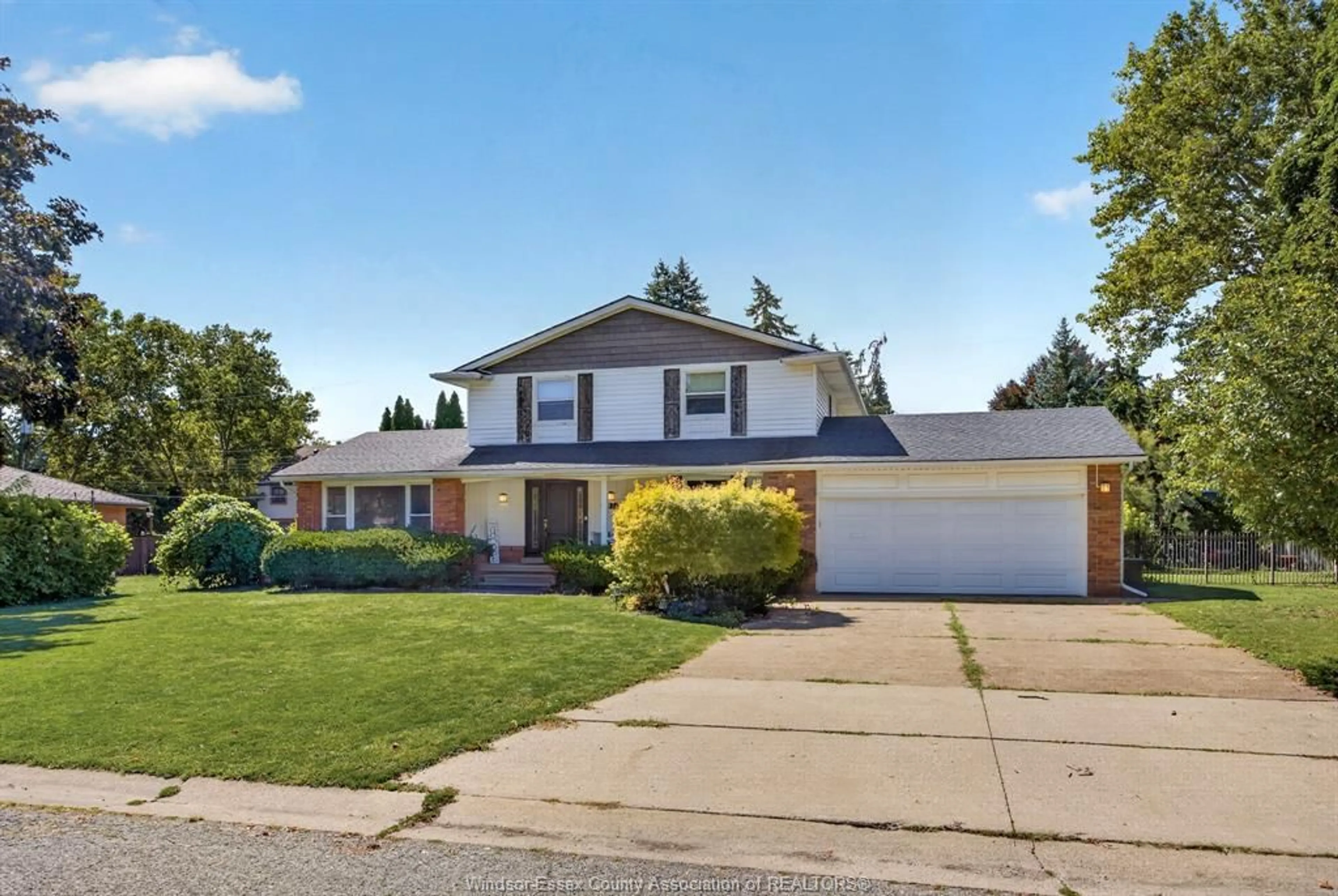Home with vinyl exterior material, street for 2477 MARK Ave, Windsor Ontario N9E 2W2