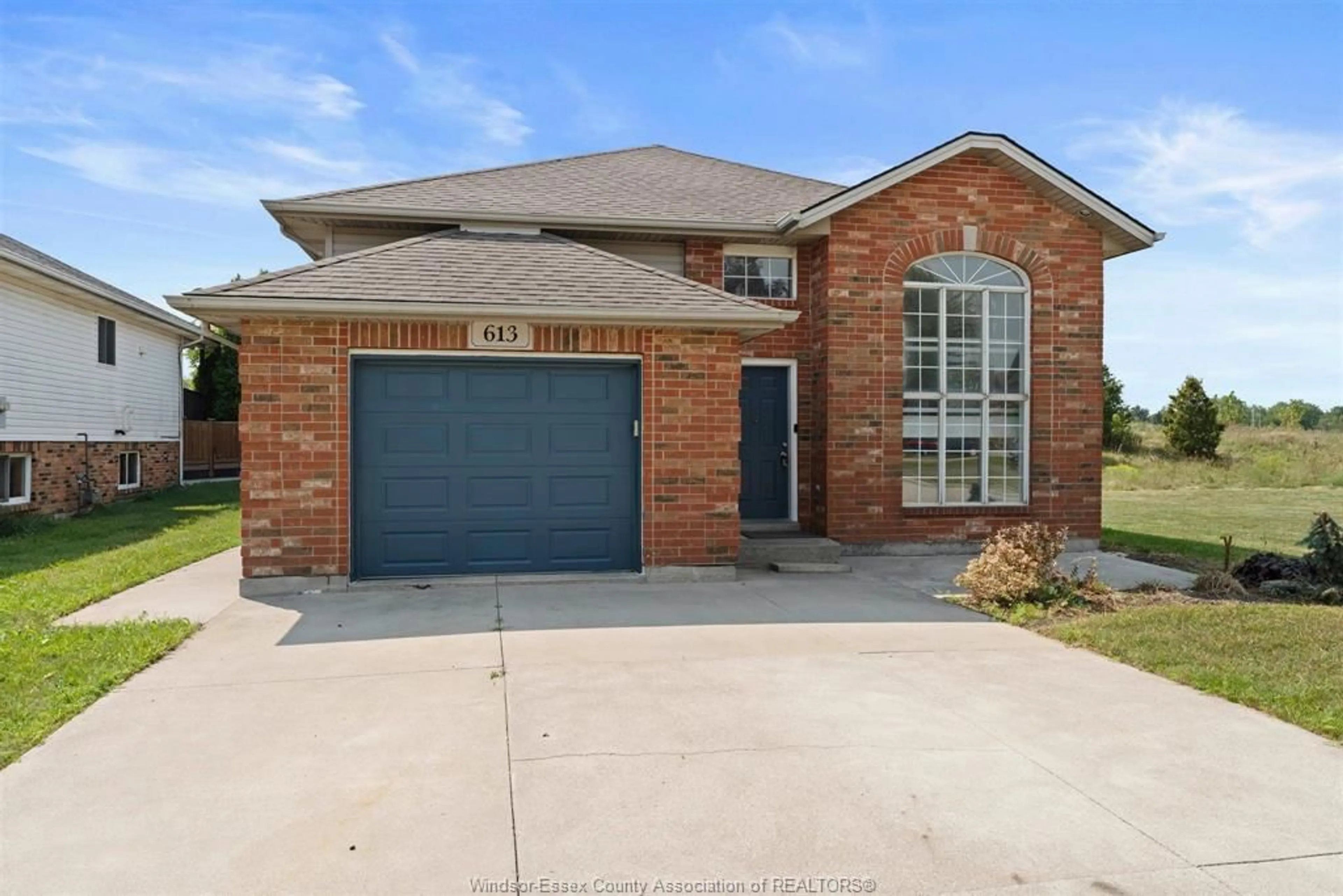 Home with brick exterior material, street for 613 HAVENS Dr, Windsor Ontario N9C 2S5
