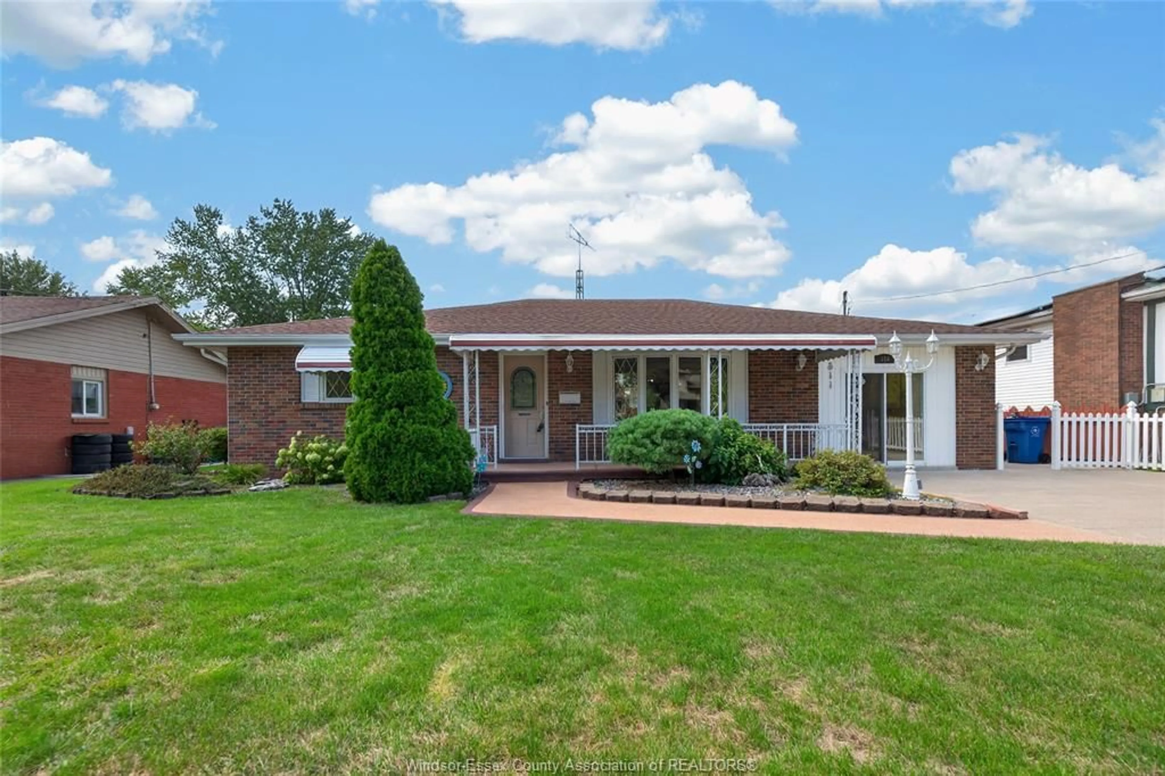Home with brick exterior material, street for 326 Evelyn St, Belle River Ontario N8L 0L3