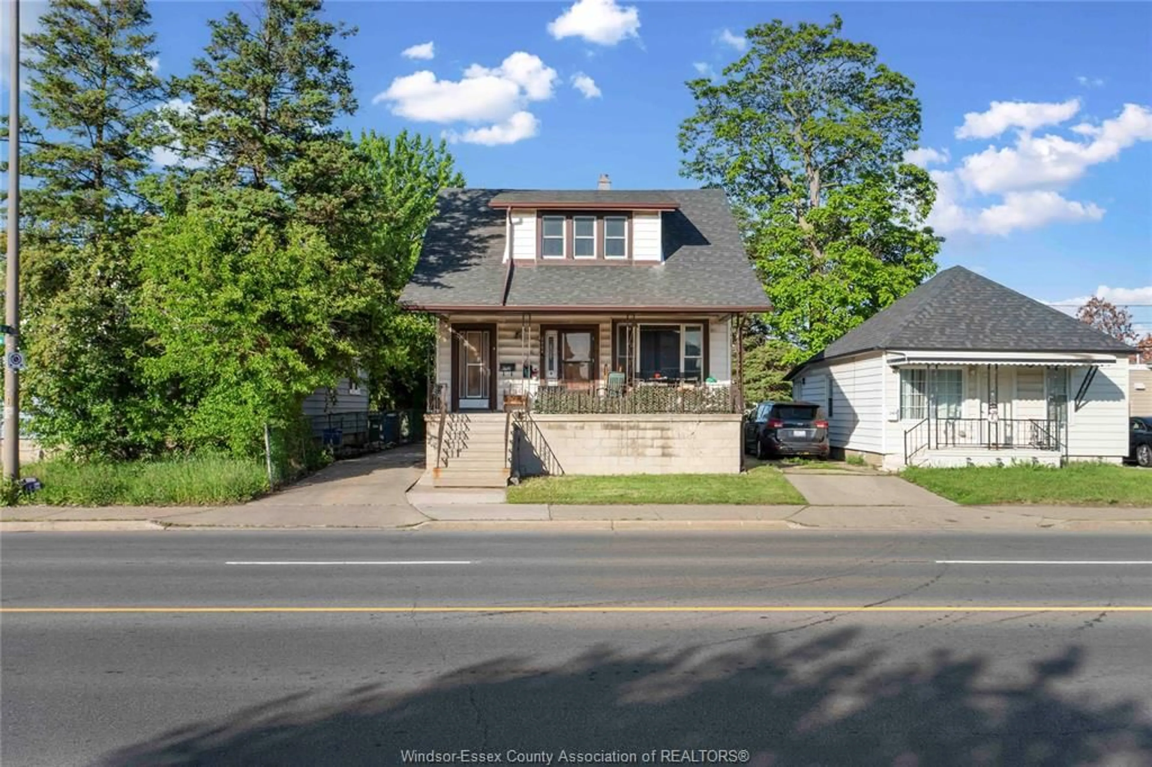 Home with brick exterior material, street for 2404 Howard Ave, Windsor Ontario N8T 2M1