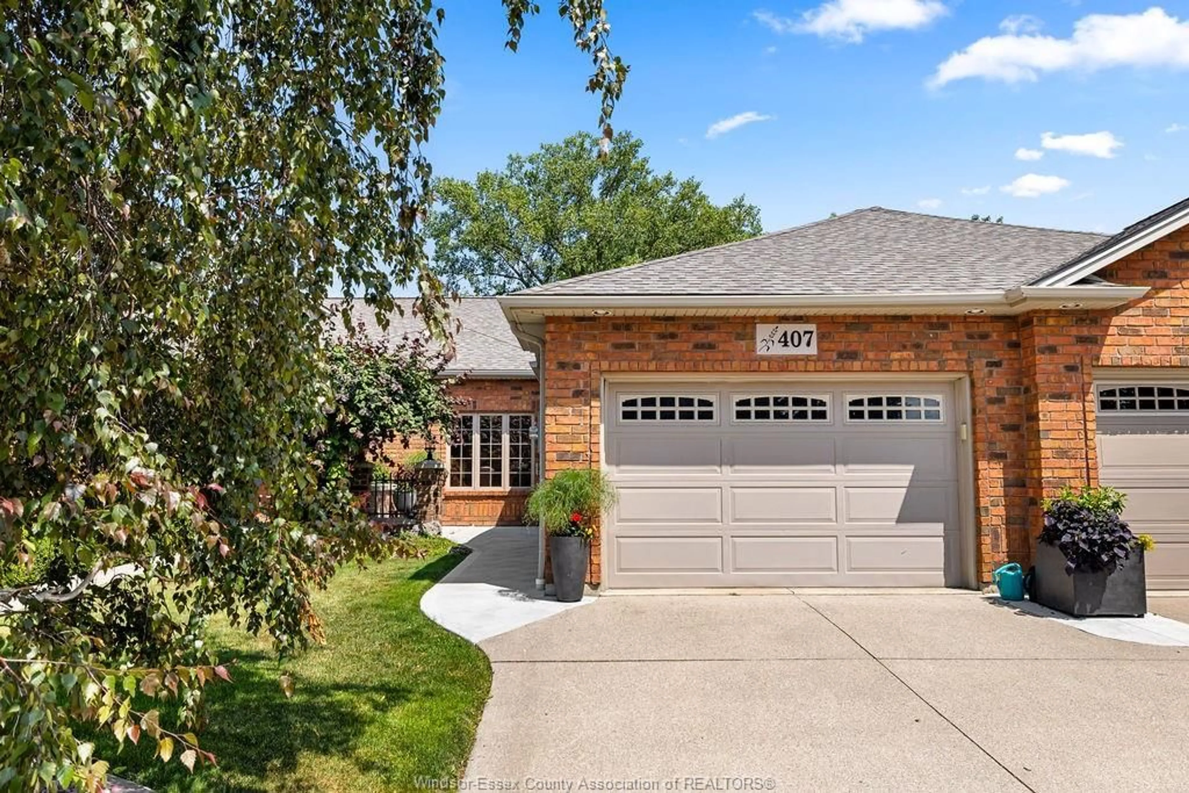 Home with brick exterior material, street for 407 LENORE ST, Belle River Ontario N8L 0P3