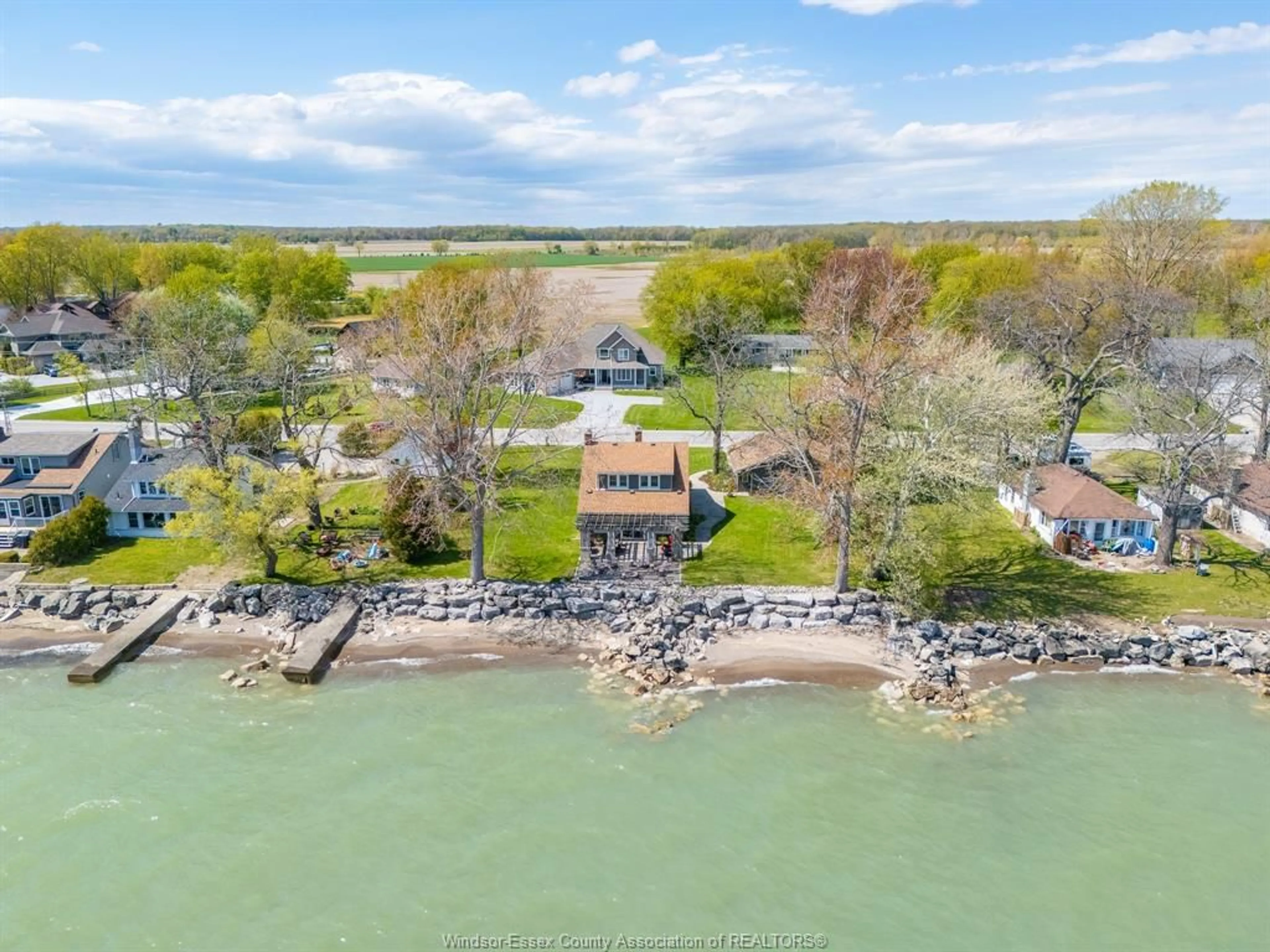 A pic from outside/outdoor area/front of a property/back of a property/a pic from drone, water/lake/river/ocean view for 1465 HERITAGE Rd, Kingsville Ontario N9Y 2E6
