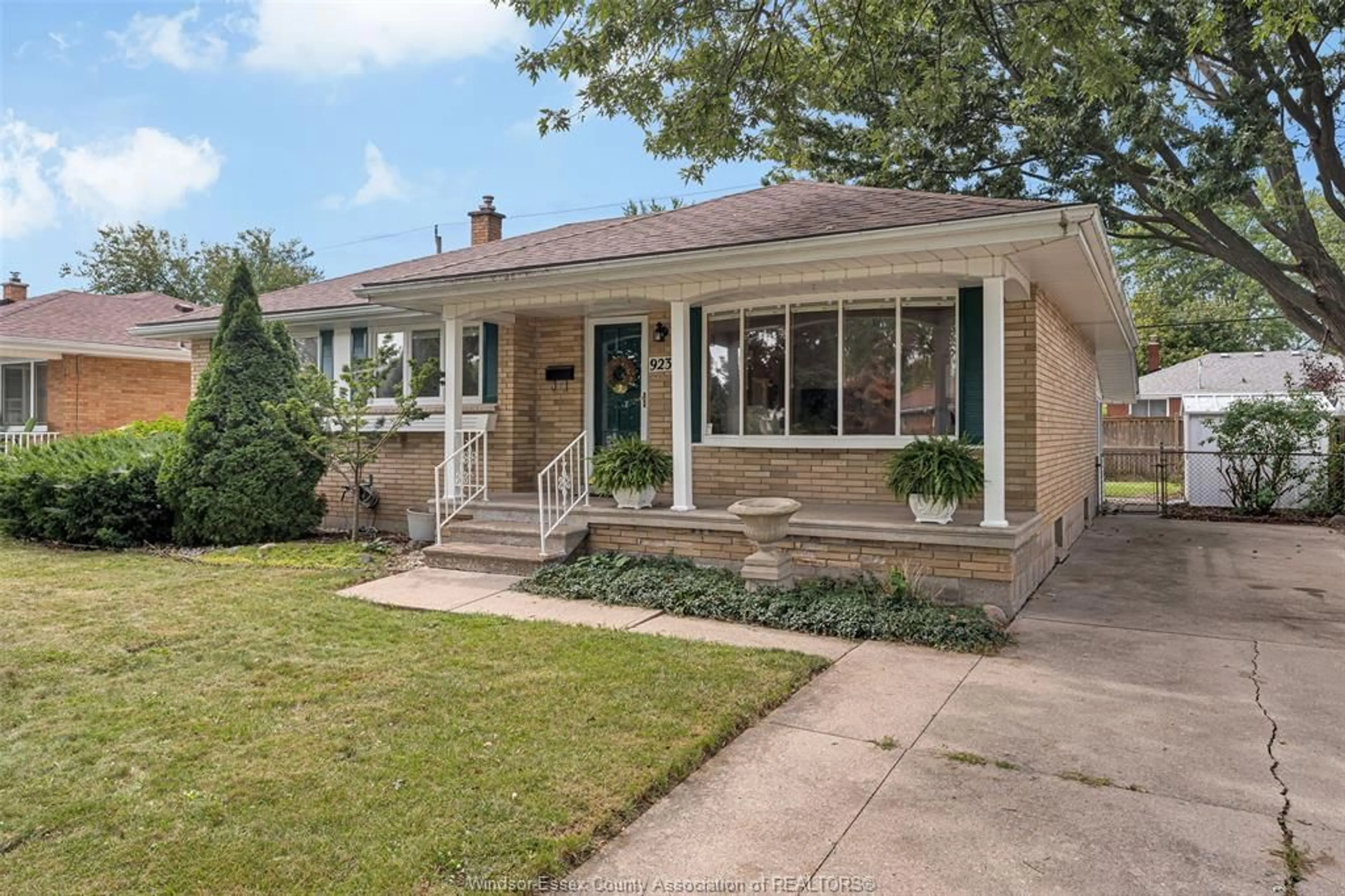 Home with brick exterior material, street for 923 GREENDALE Dr, Windsor Ontario N8S 4B2