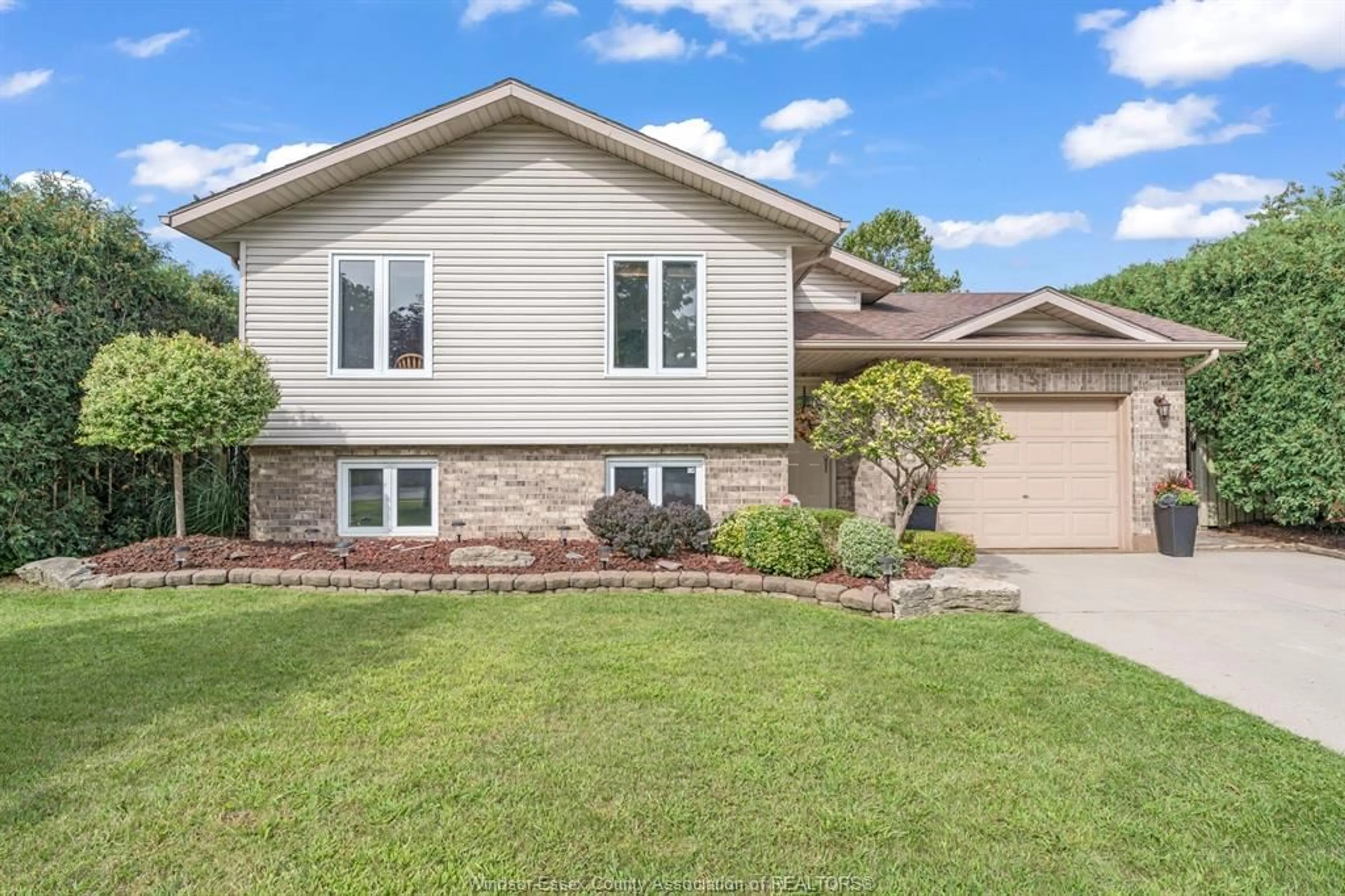 Home with brick exterior material, street for 3 Carter Ave, Leamington Ontario N8H 5E1