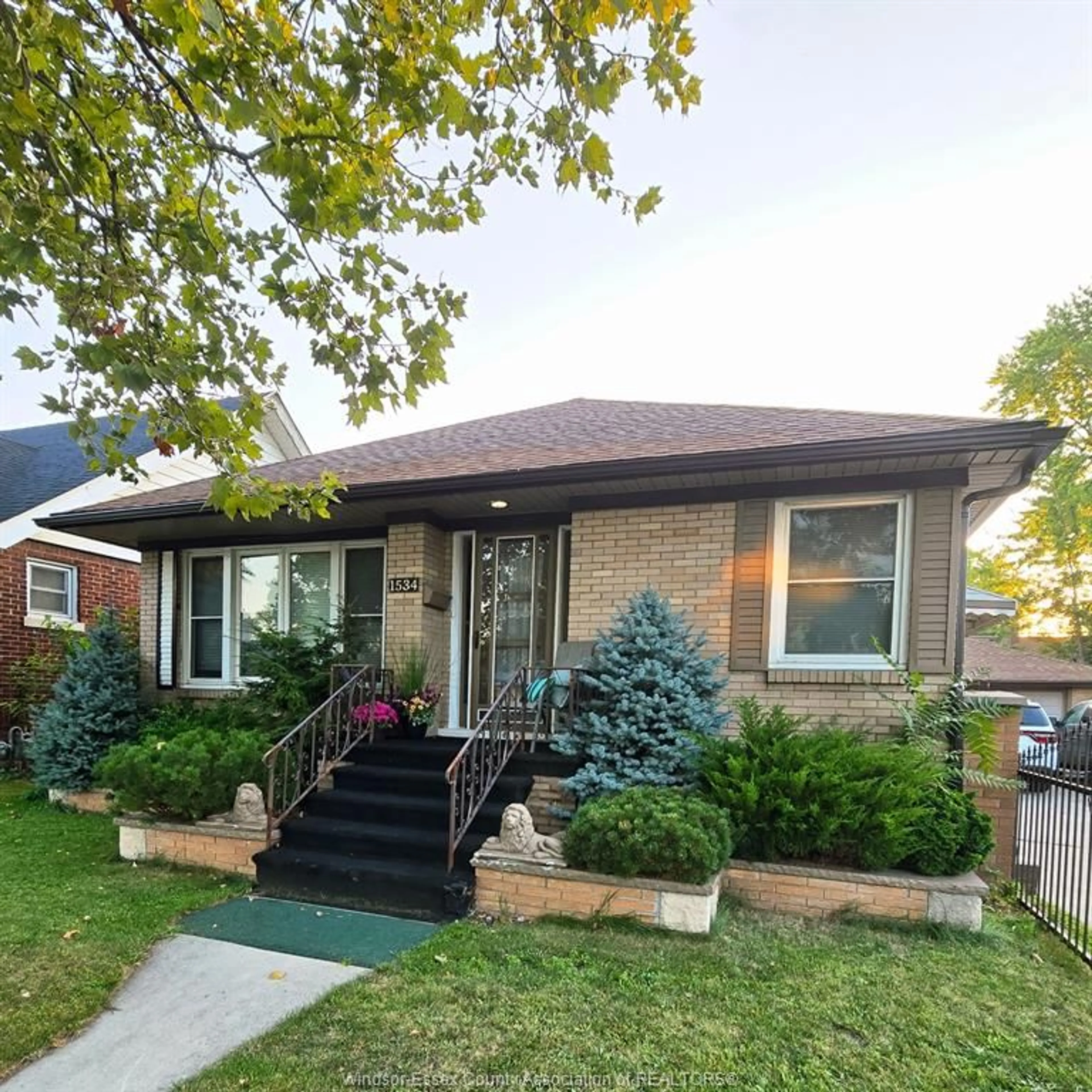 Home with brick exterior material, street for 1534 PILLETTE Rd, Windsor Ontario N8Y 3C2