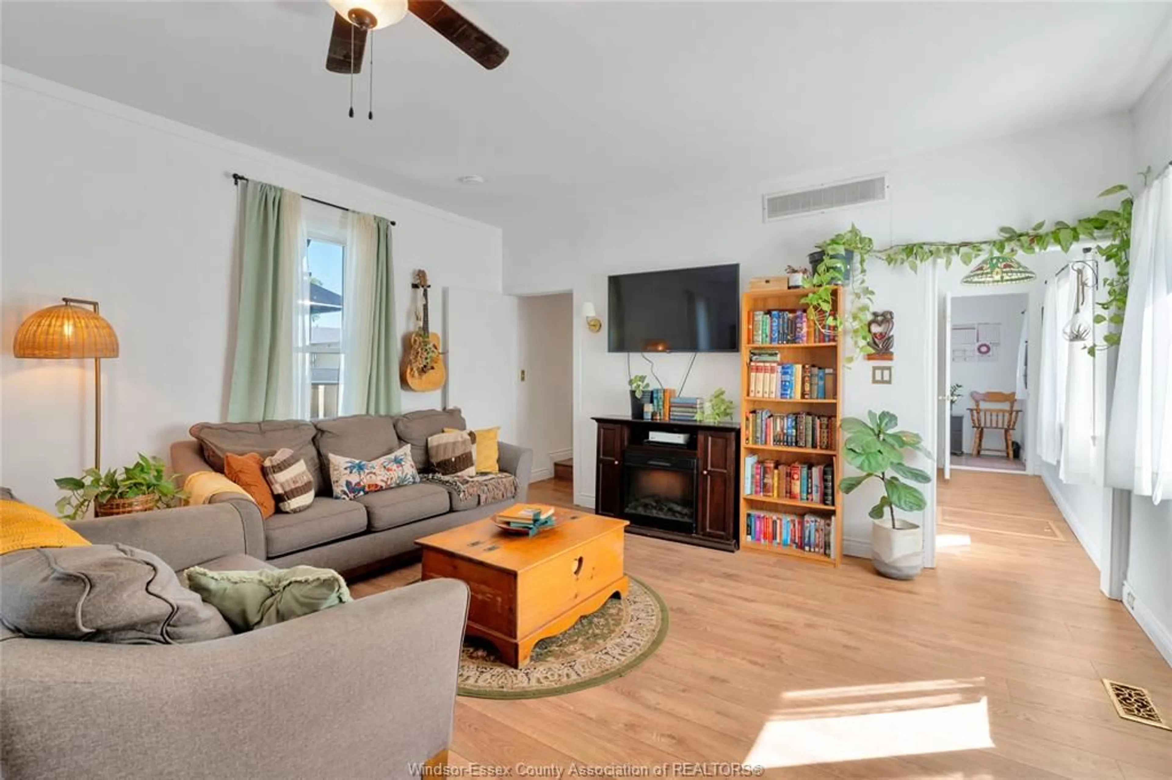Living room with furniture, wood/laminate floor for 198 BROCK, Amherstburg Ontario N9V 2G9