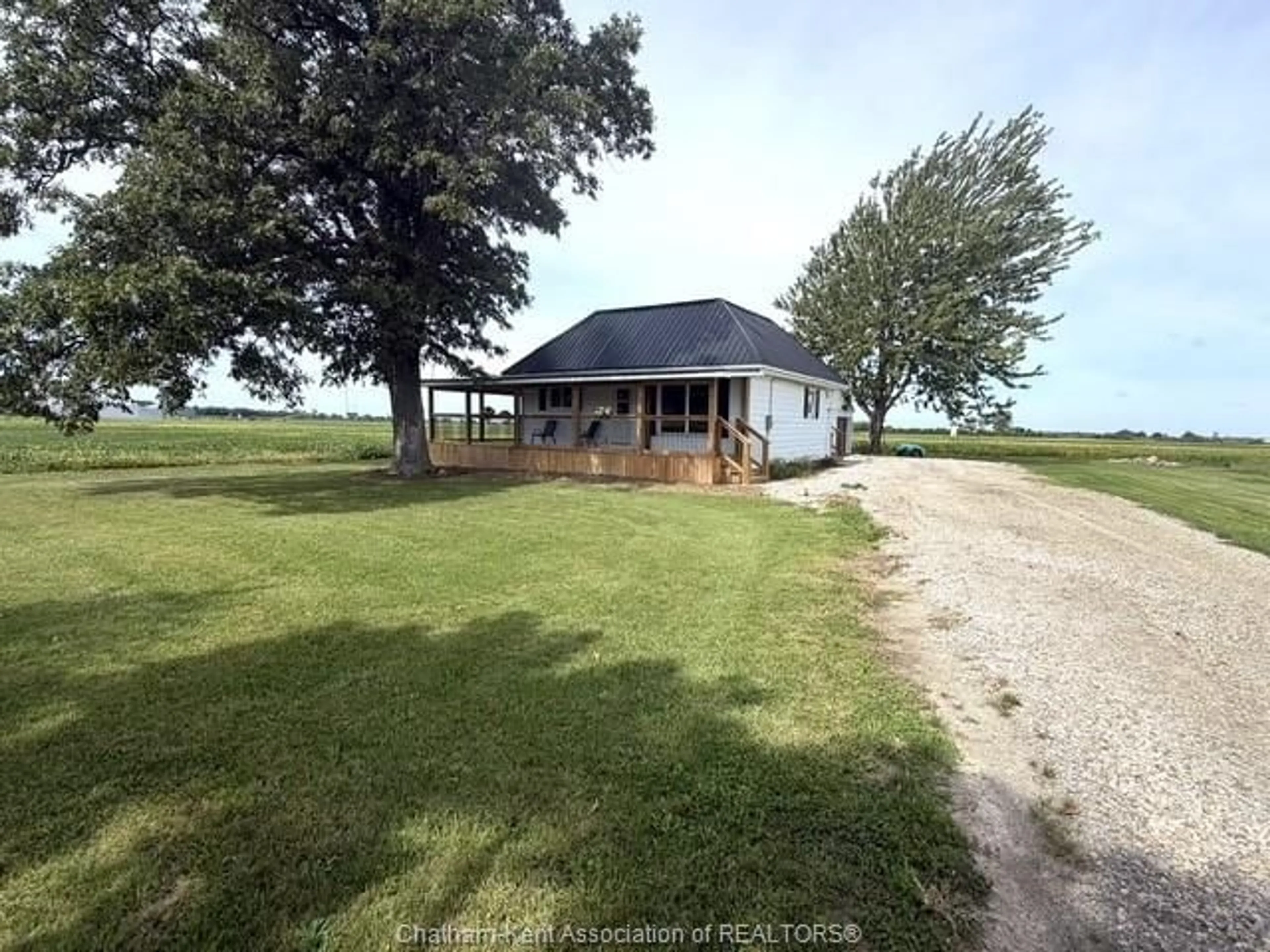 A pic from outside/outdoor area/front of a property/back of a property/a pic from drone, water/lake/river/ocean view for 10817 Knights Line, Blenheim Ontario N0P 1A0