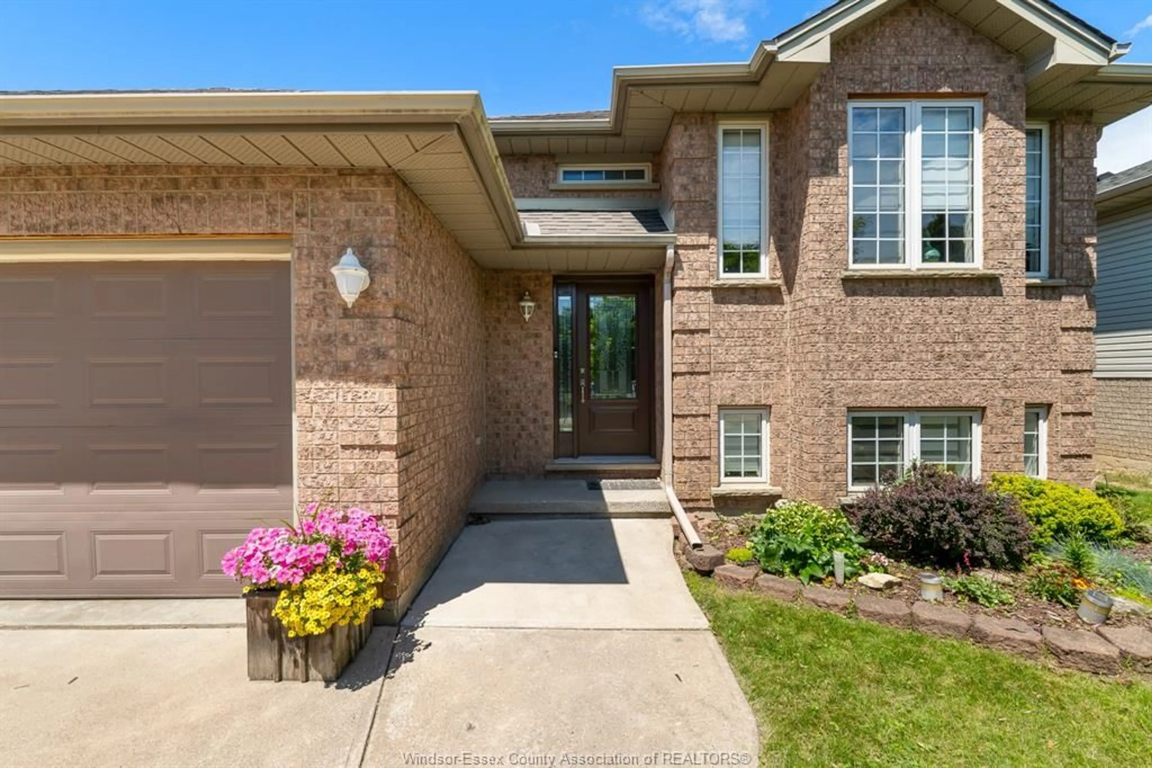 Home with brick exterior material, street for 3883 Aristotle Cres, Windsor Ontario N9G 2N9