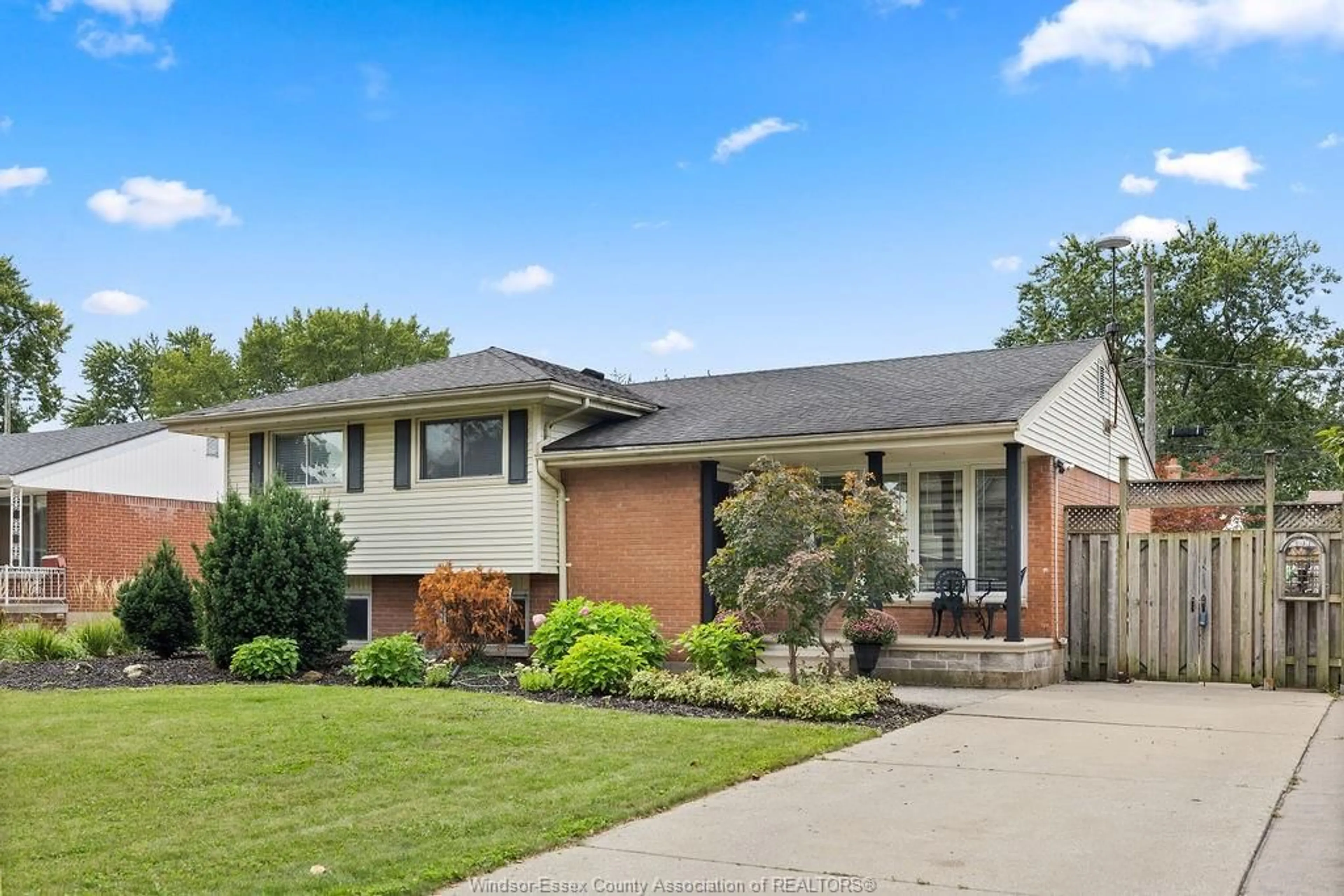 Home with brick exterior material, street for 1023 MARJORIE Dr, Windsor Ontario N8S 4A2