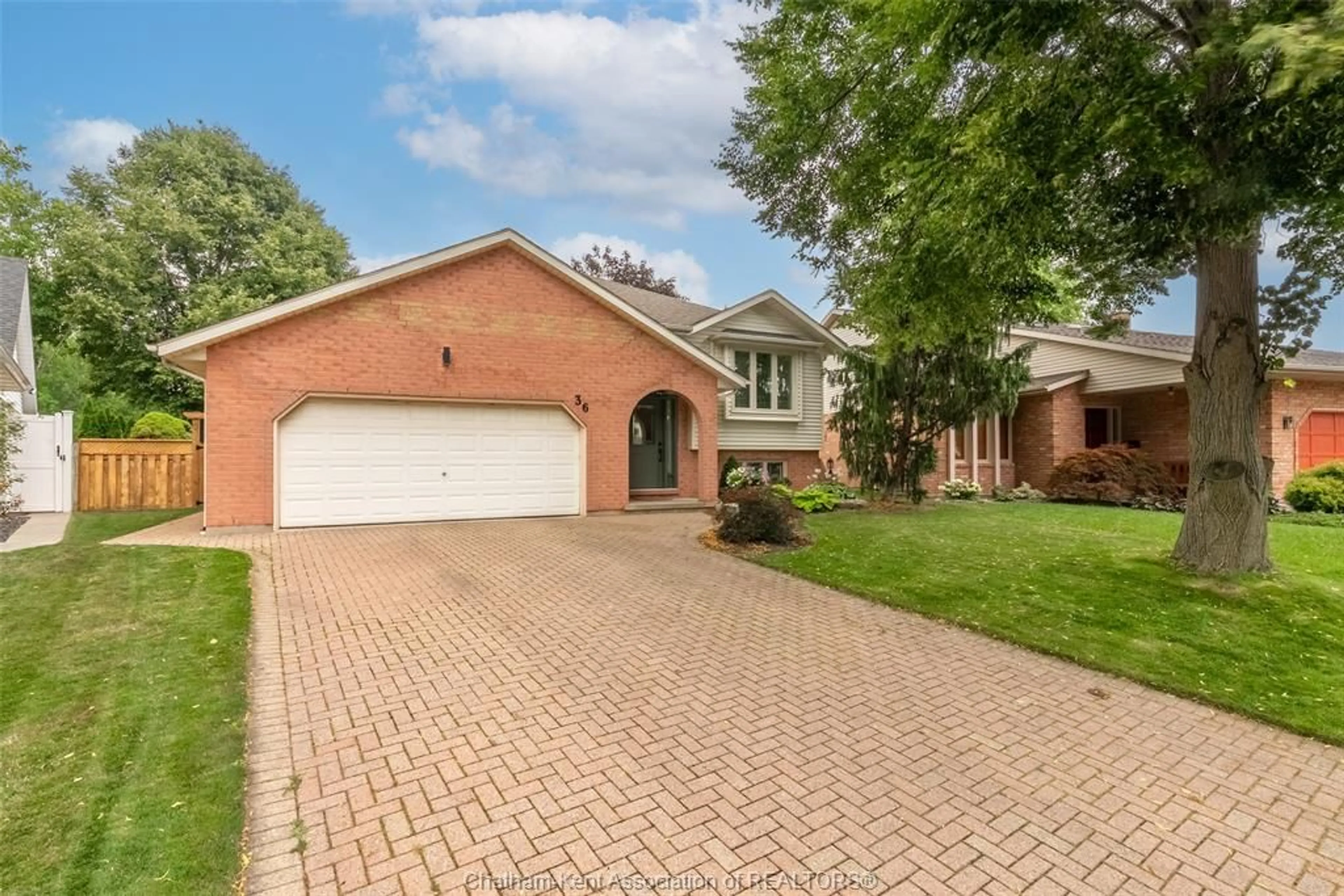 Home with brick exterior material, street for 36 Plantation Pl, Chatham Ontario N7M 6G7