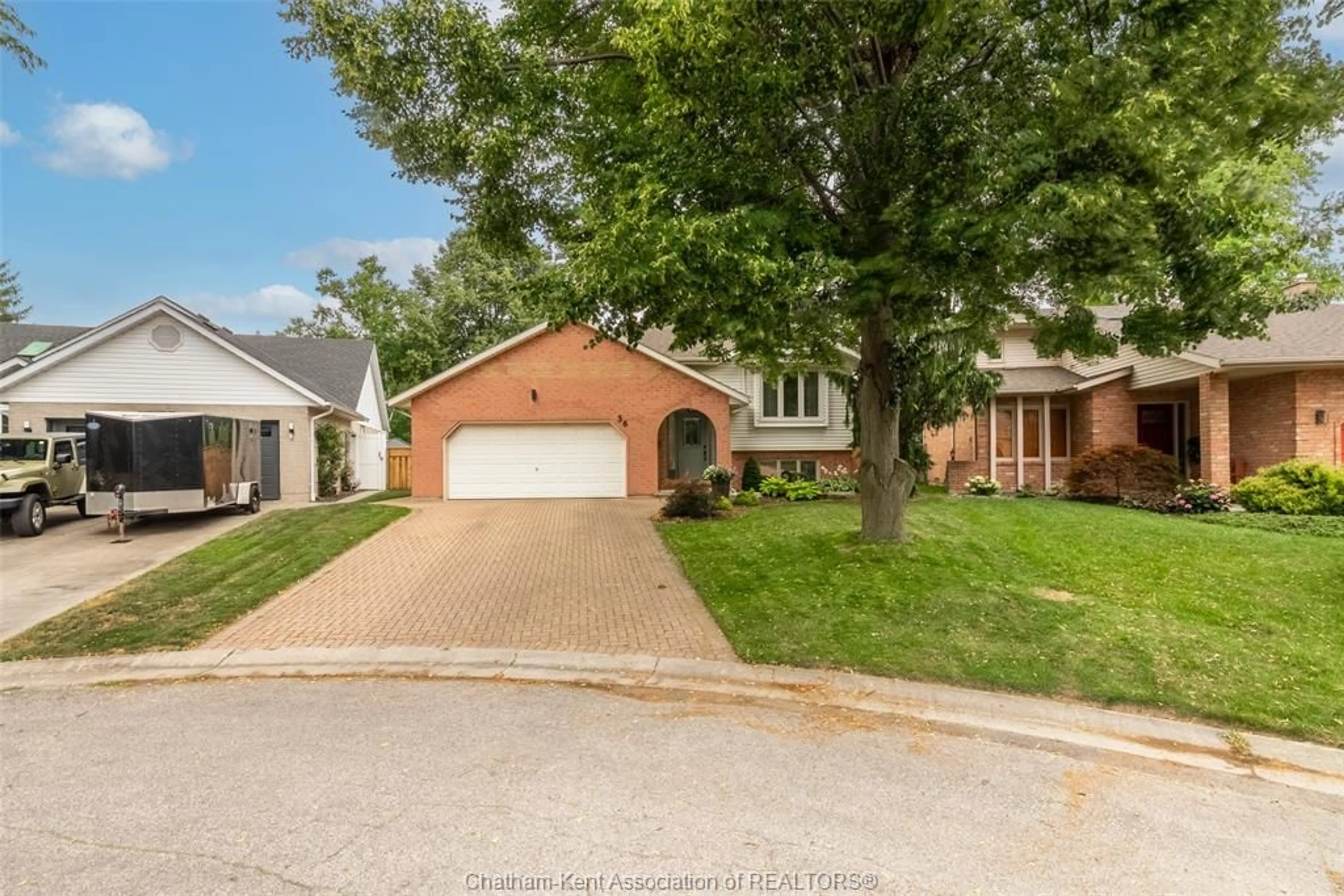 Home with brick exterior material, street for 36 Plantation Pl, Chatham Ontario N7M 6G7