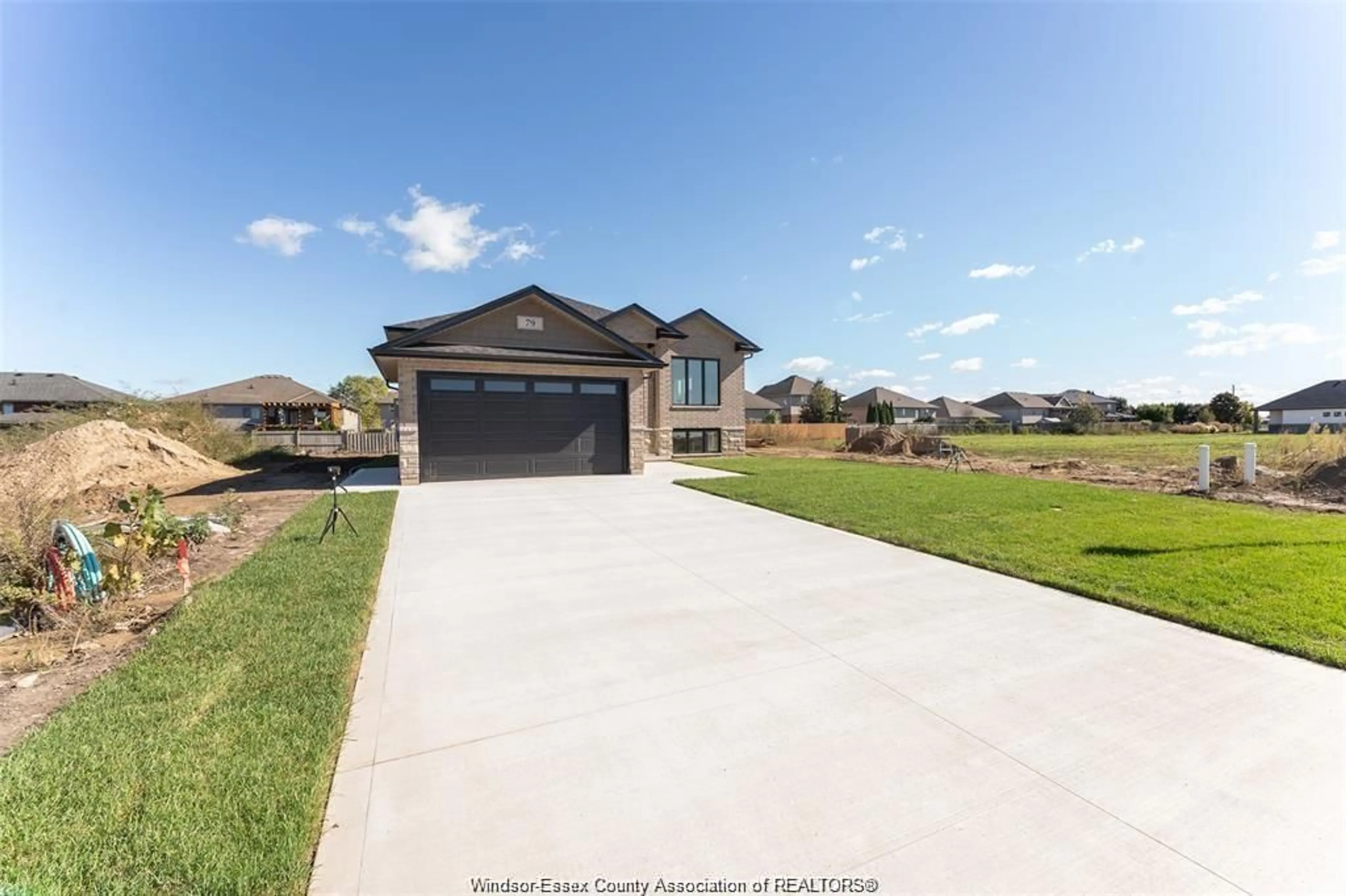 A pic from outside/outdoor area/front of a property/back of a property/a pic from drone, water/lake/river/ocean view for 51 FENCELINE Dr, Chatham Ontario N7M 0V7