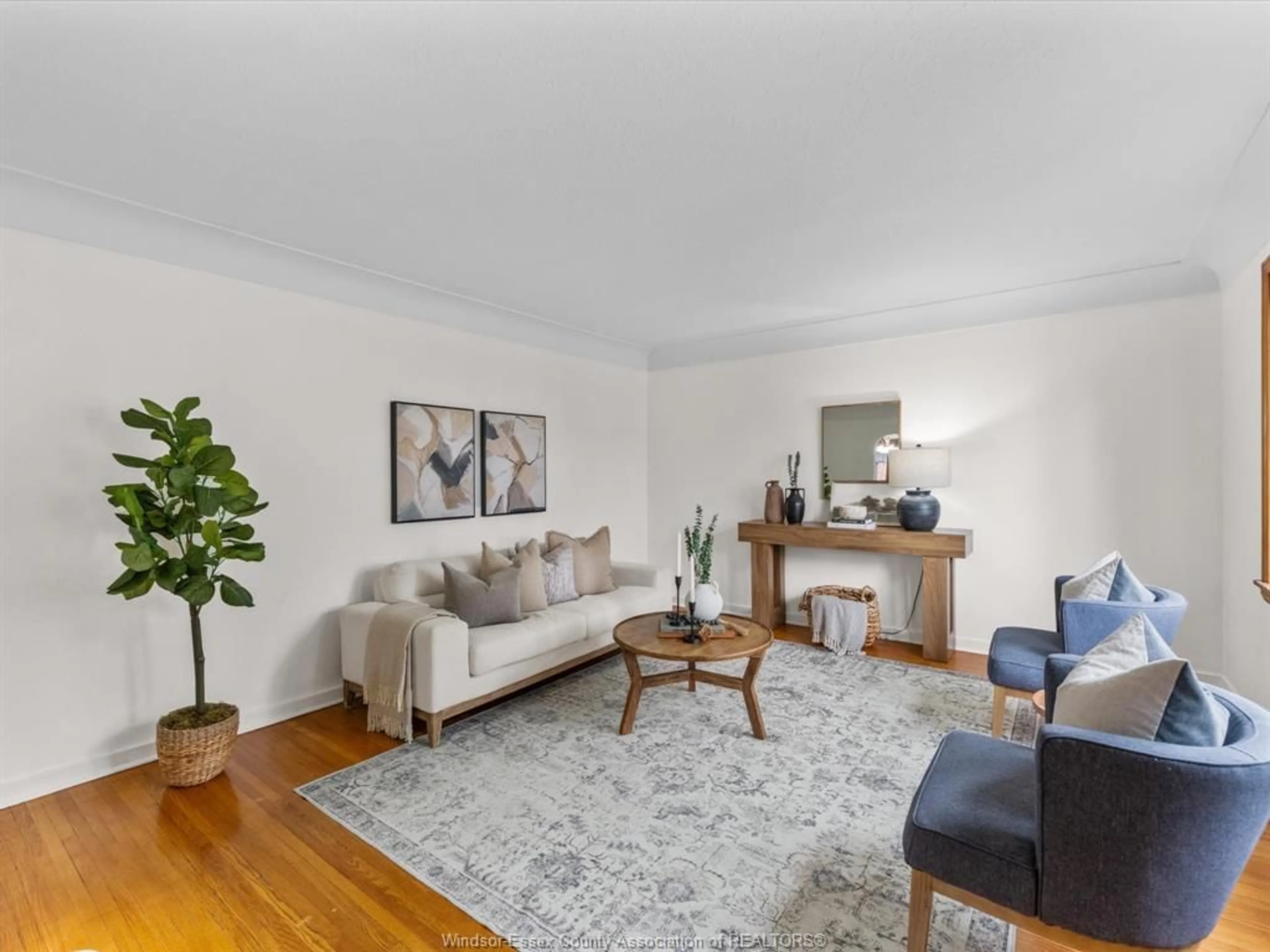Living room with furniture, wood/laminate floor for 2567 WINDERMERE, Windsor Ontario N8W 2T5