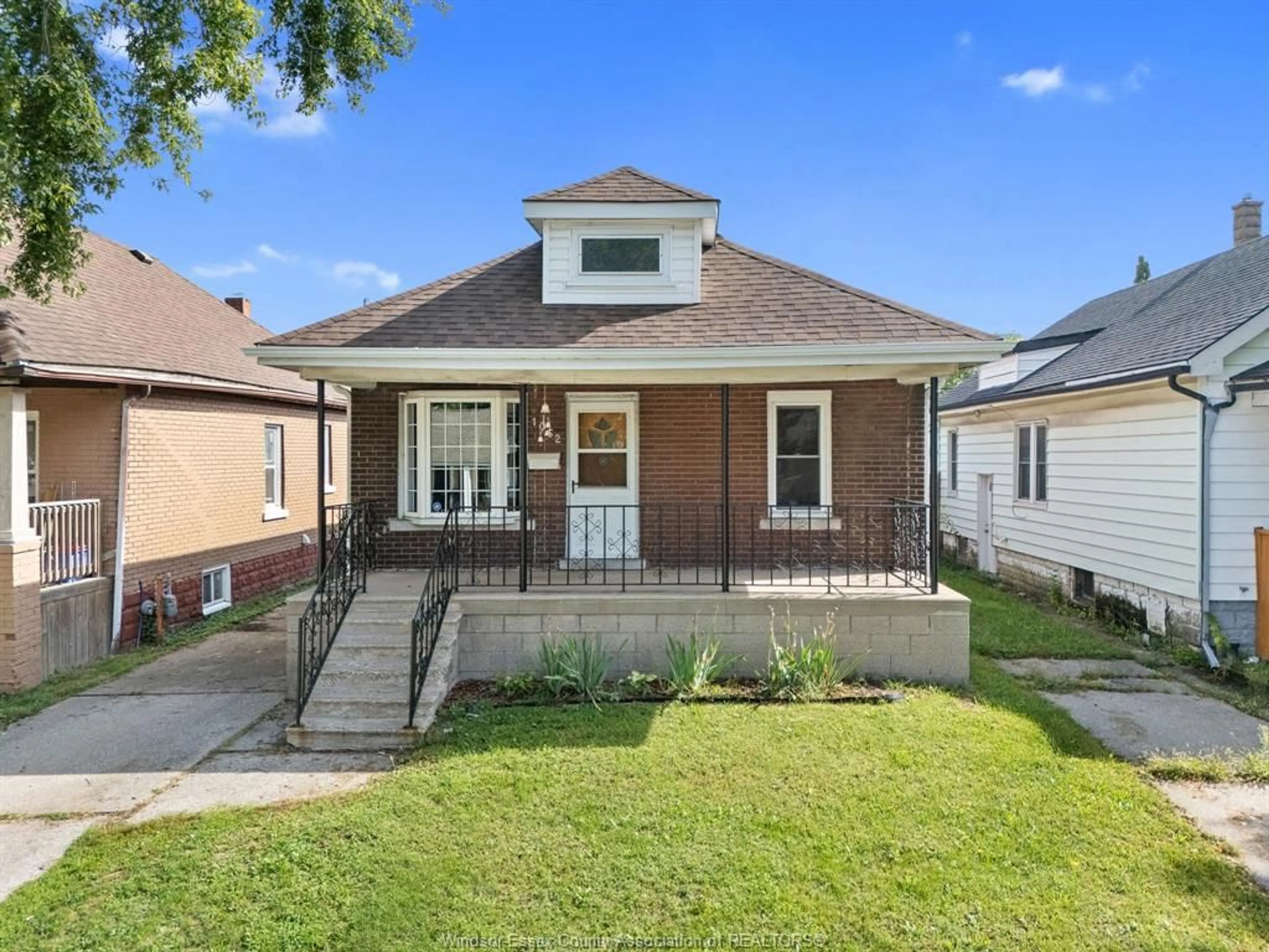Home with brick exterior material, street for 1052 Felix Ave, Windsor Ontario N9C 3L5