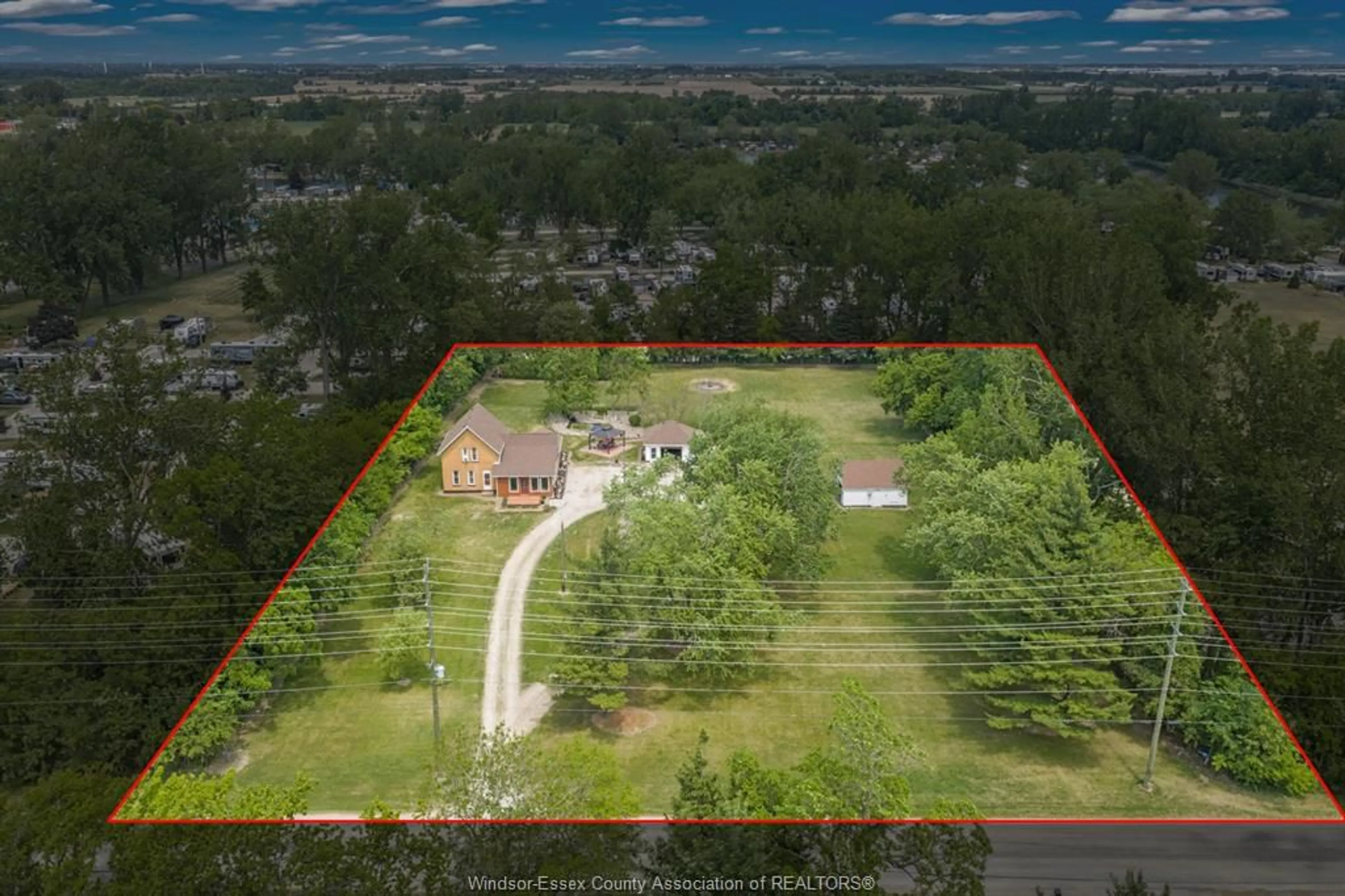 A pic from outside/outdoor area/front of a property/back of a property/a pic from drone, water/lake/river/ocean view for 125 Mersea Rd 5, Leamington Ontario N8H 3V5