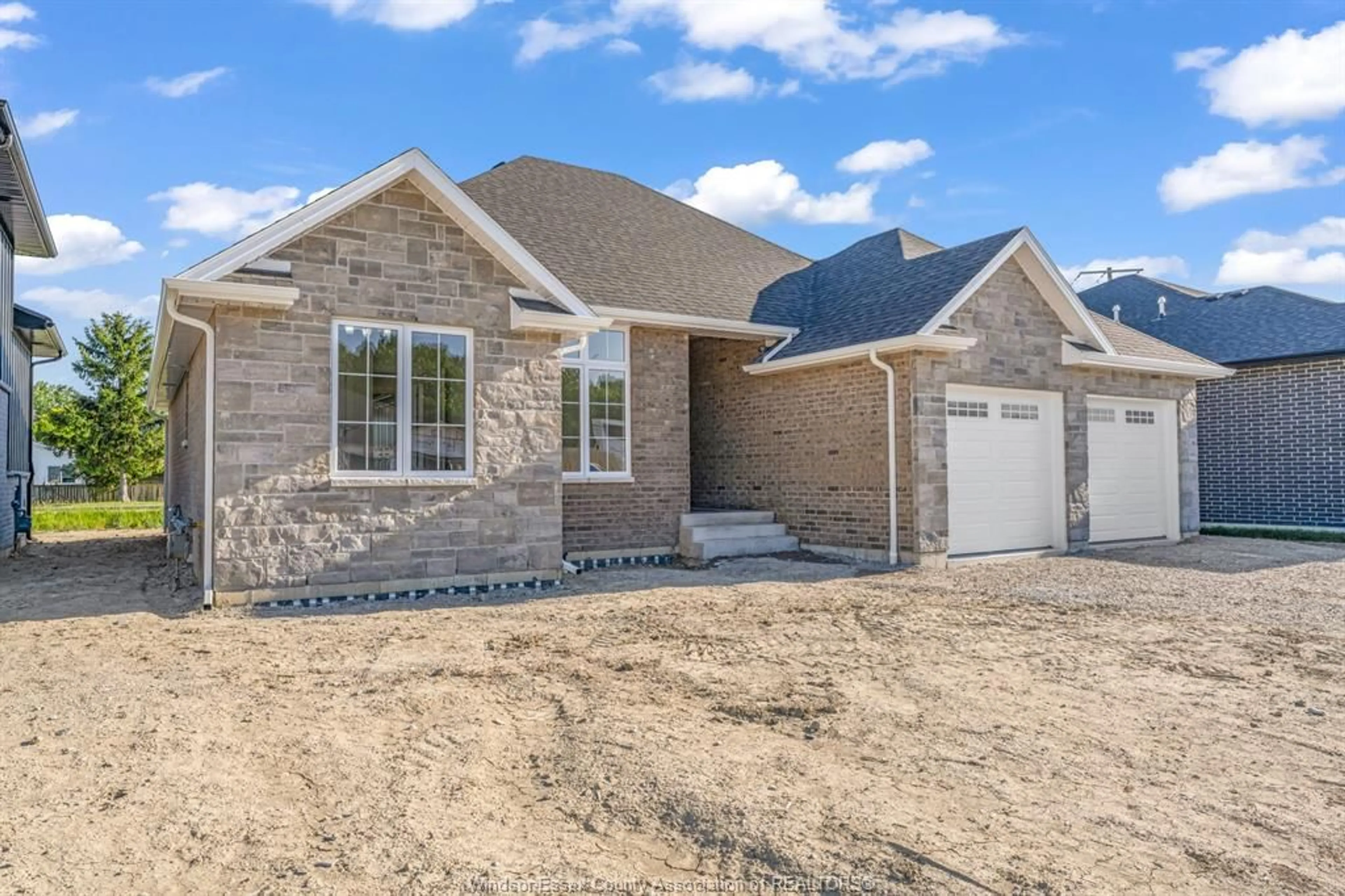 Home with brick exterior material, street for 12175 DUCHARME Lane, McGregor Ontario N0R 1J0