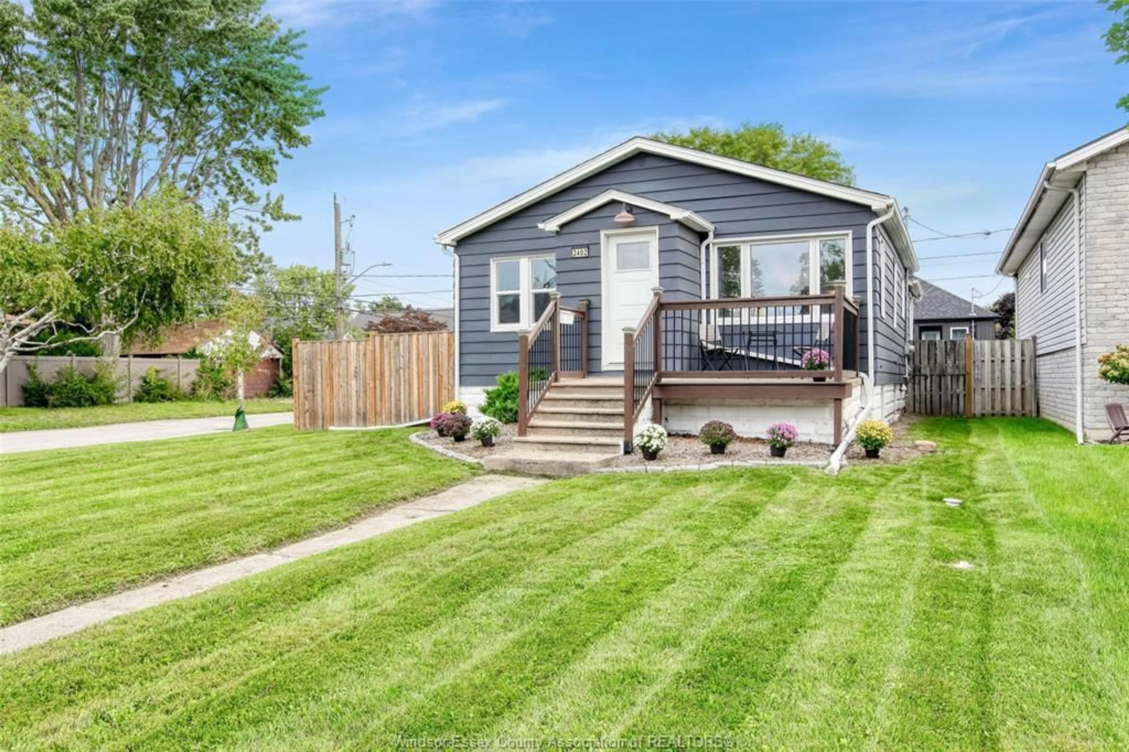 Home with vinyl exterior material, street for 2402 Tourangeau, Windsor Ontario N8W 4N7