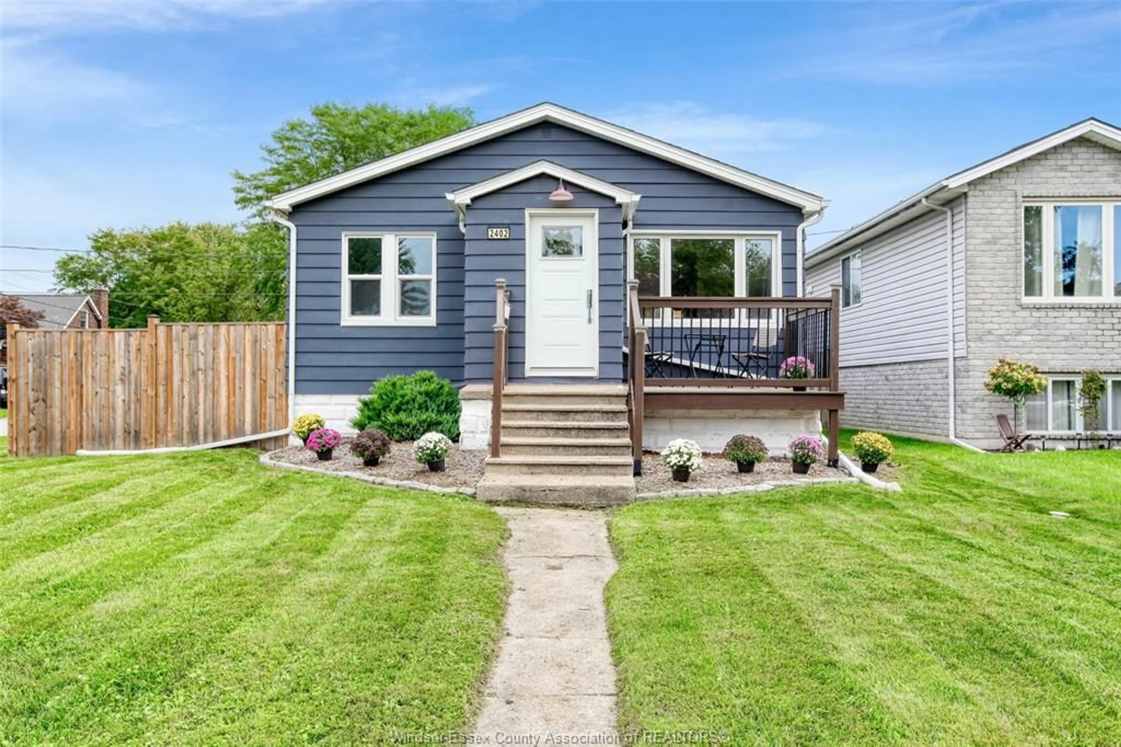Home with vinyl exterior material, street for 2402 Tourangeau, Windsor Ontario N8W 4N7