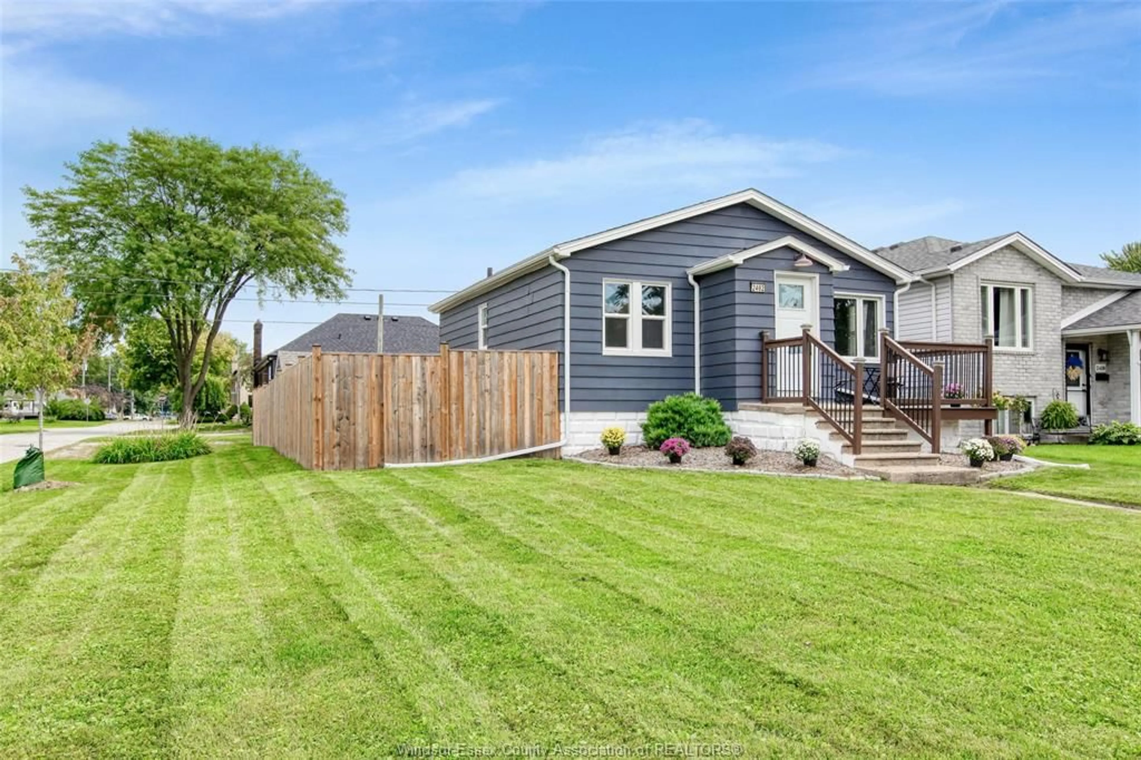 Home with vinyl exterior material, street for 2402 Tourangeau, Windsor Ontario N8W 4N7