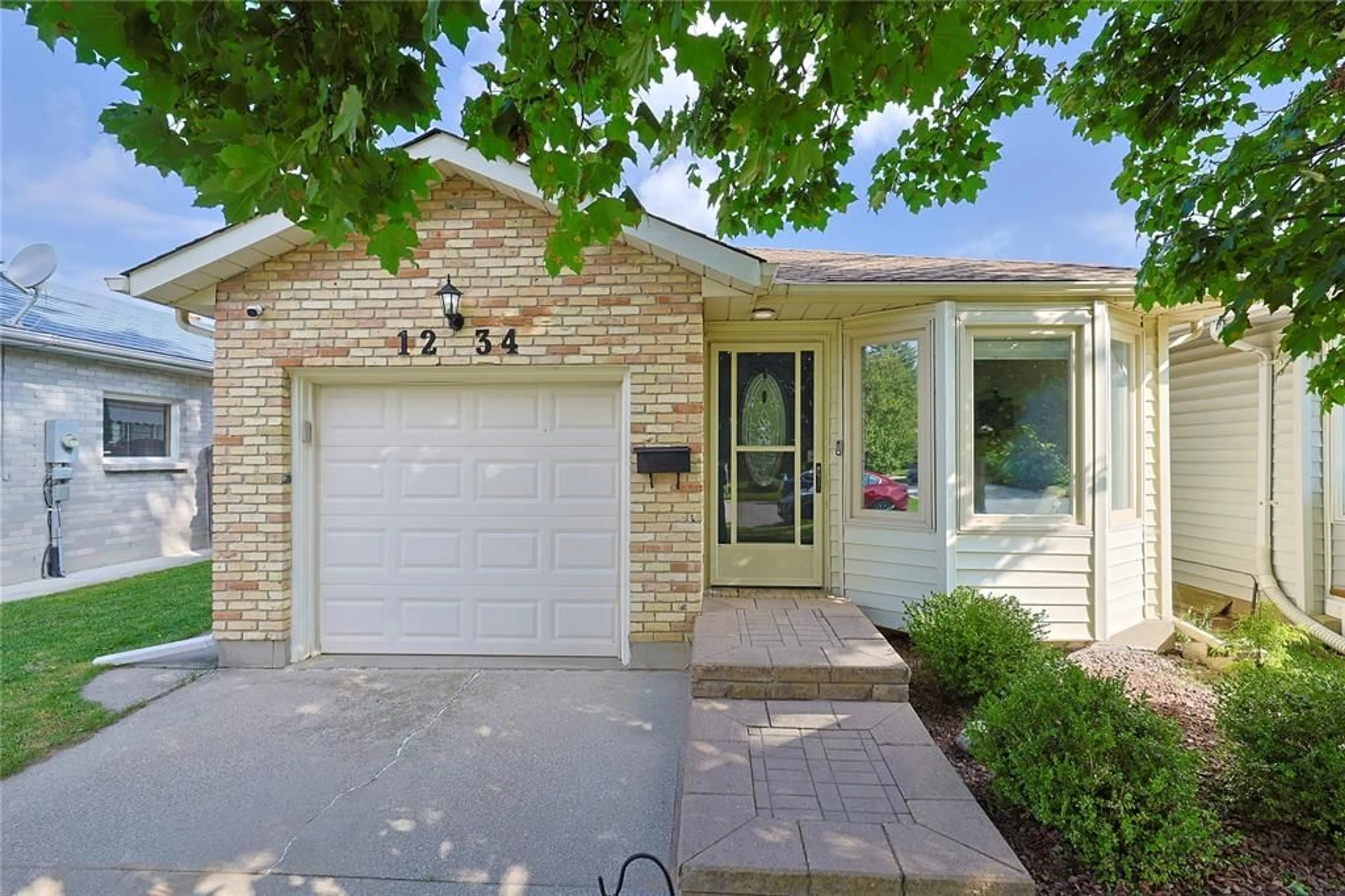Home with brick exterior material, street for 1234 Thistledown Ave, Sarnia Ontario N7S 5A9