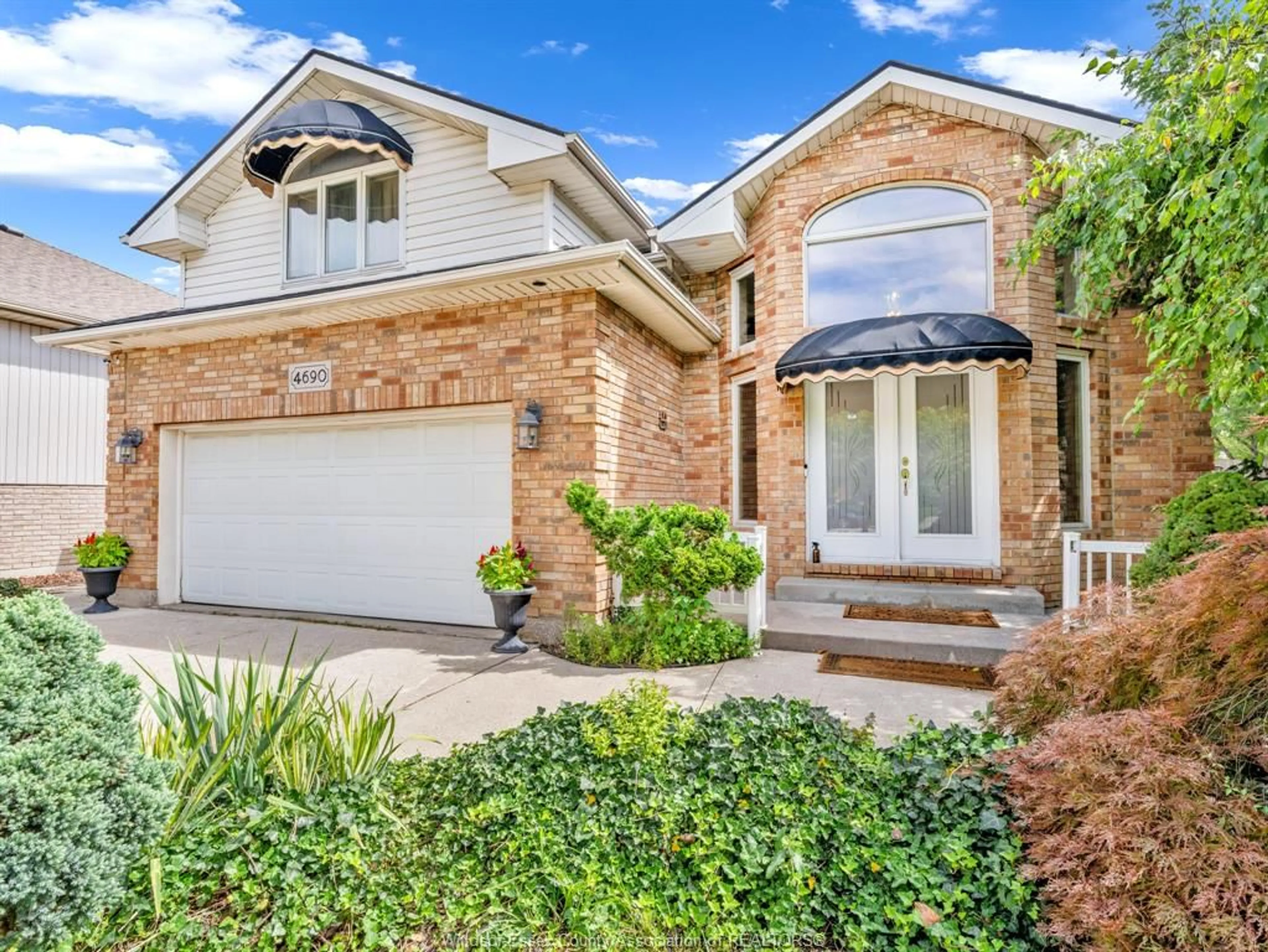 Home with brick exterior material, street for 4690 JESSICA Way, Windsor Ontario N9G 2S4