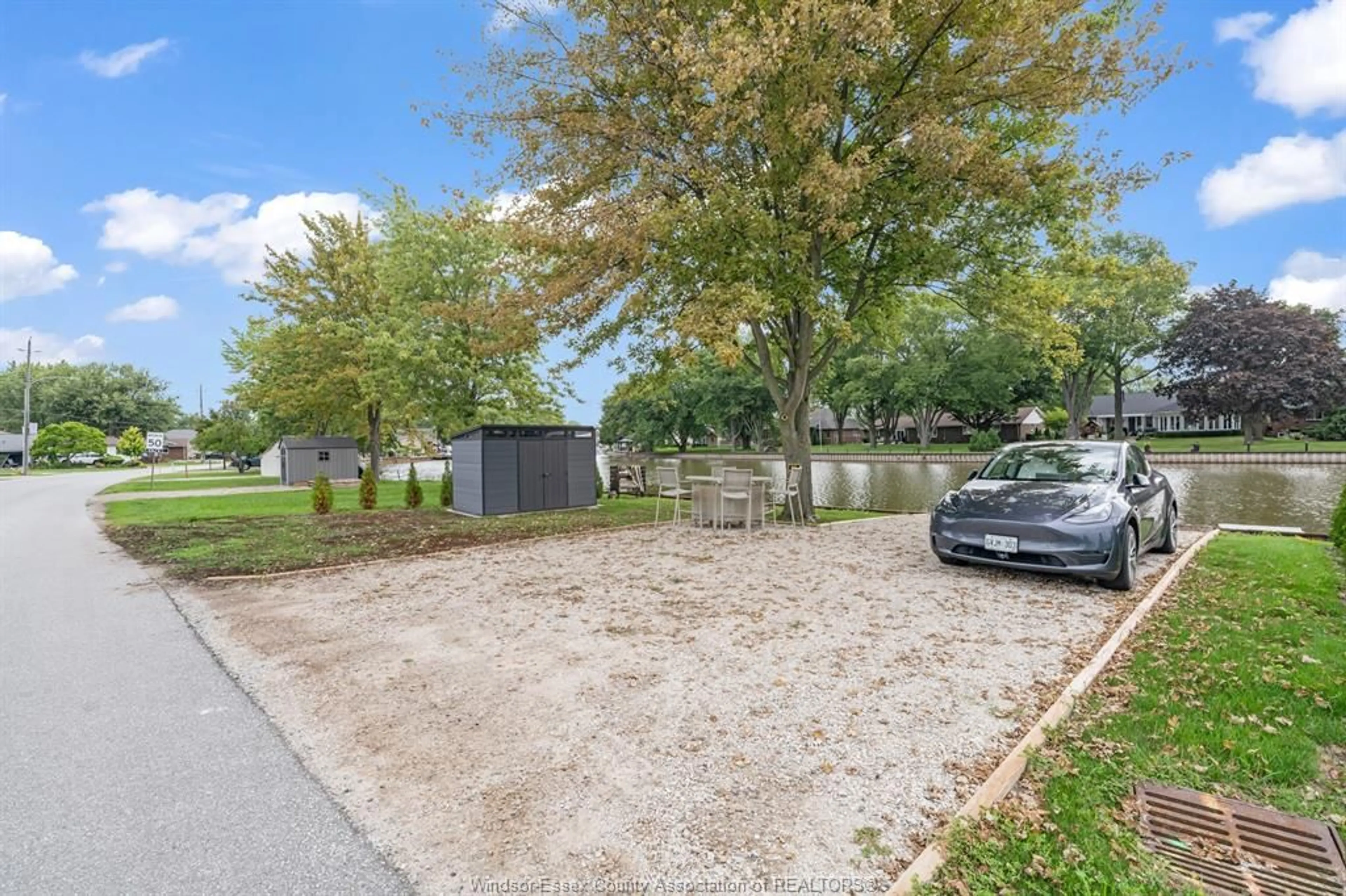 A pic from outside/outdoor area/front of a property/back of a property/a pic from drone, water/lake/river/ocean view for 396 WEST BELLE RIVER Rd, Lakeshore Ontario N0R 1A0