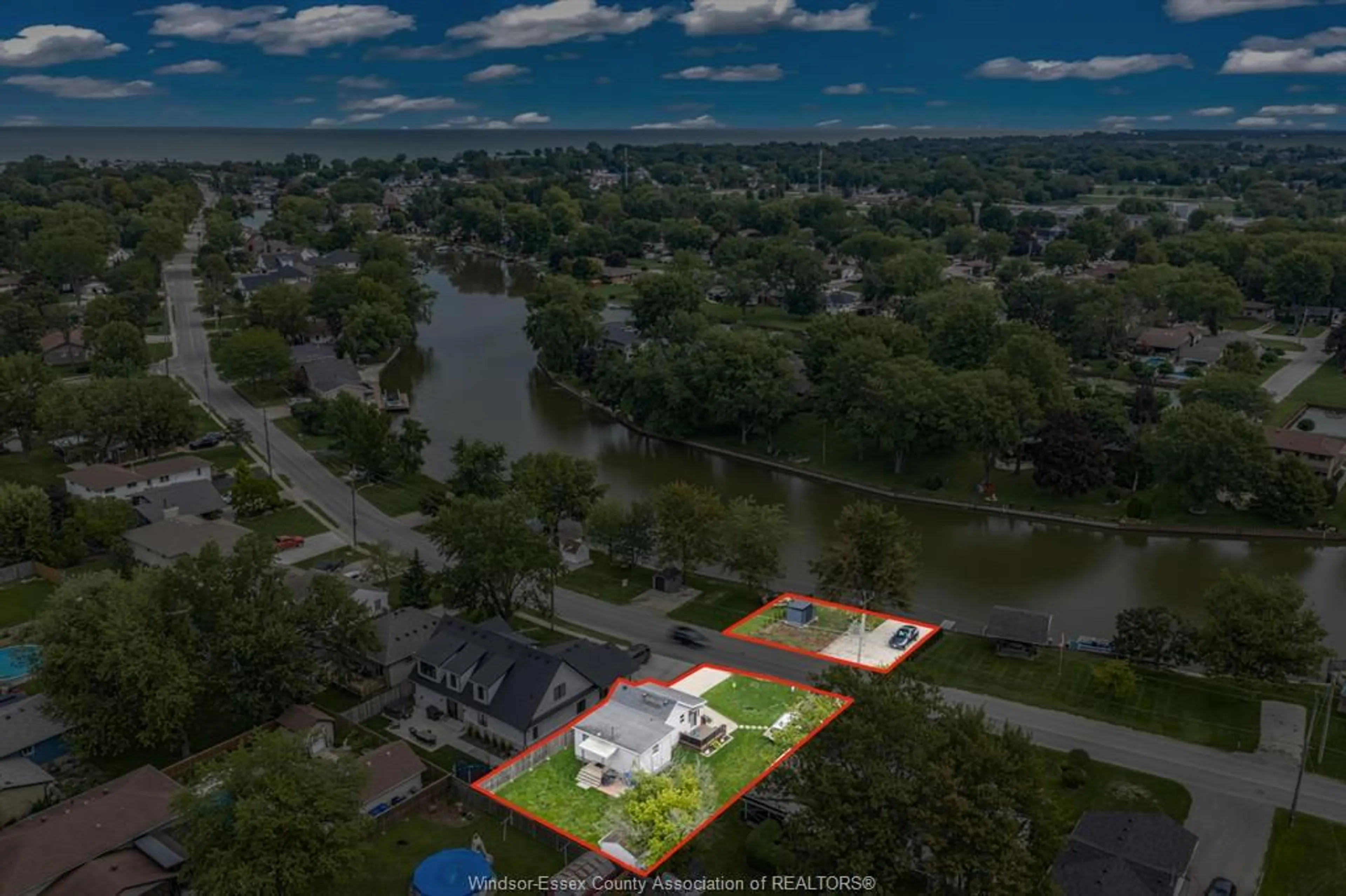 A pic from outside/outdoor area/front of a property/back of a property/a pic from drone, water/lake/river/ocean view for 396 WEST BELLE RIVER Rd, Lakeshore Ontario N0R 1A0