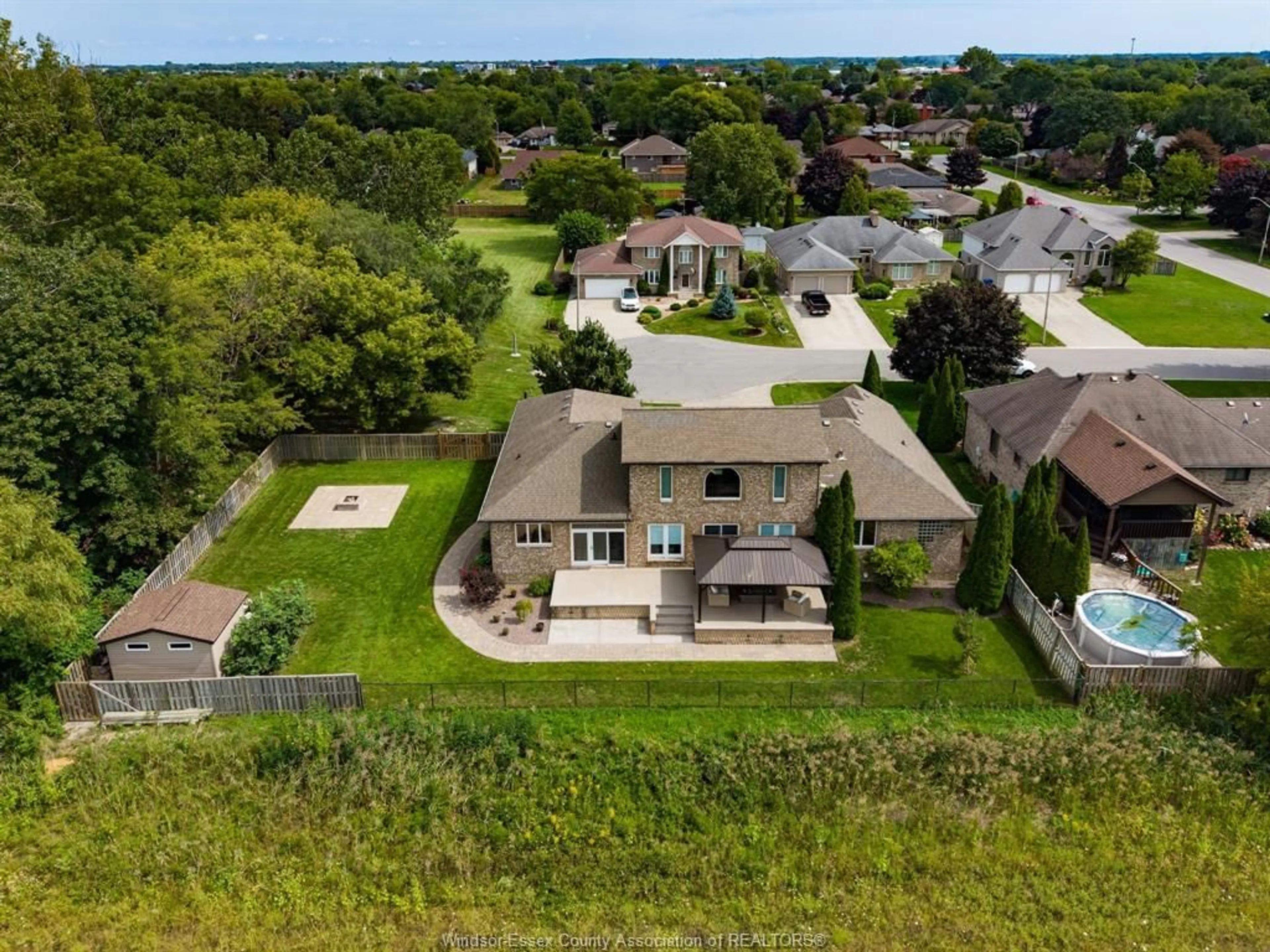 A pic from outside/outdoor area/front of a property/back of a property/a pic from drone, water/lake/river/ocean view for 1715 KAVANAUGH, Tecumseh Ontario N8N 4R3