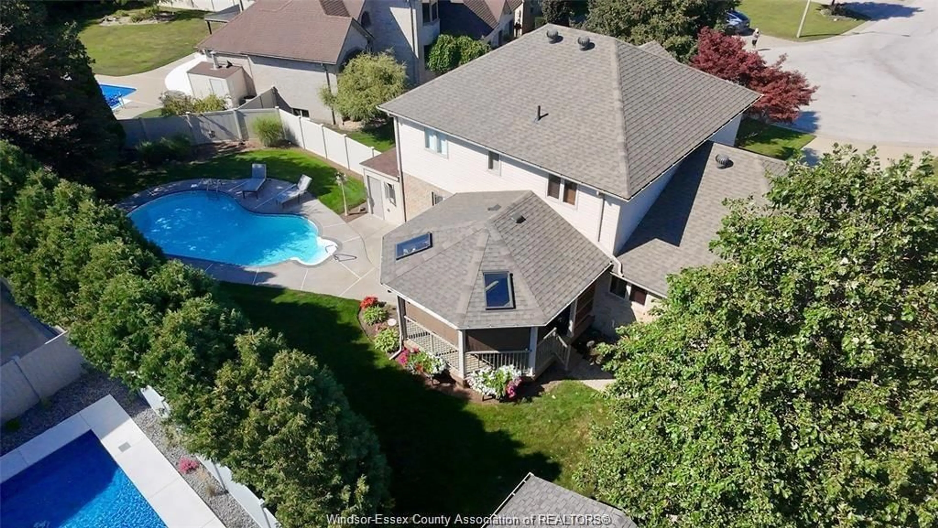 A pic from outside/outdoor area/front of a property/back of a property/a pic from drone, unknown for 128 Pheasant Run Dr, Lakeshore Ontario N8L 0Z7