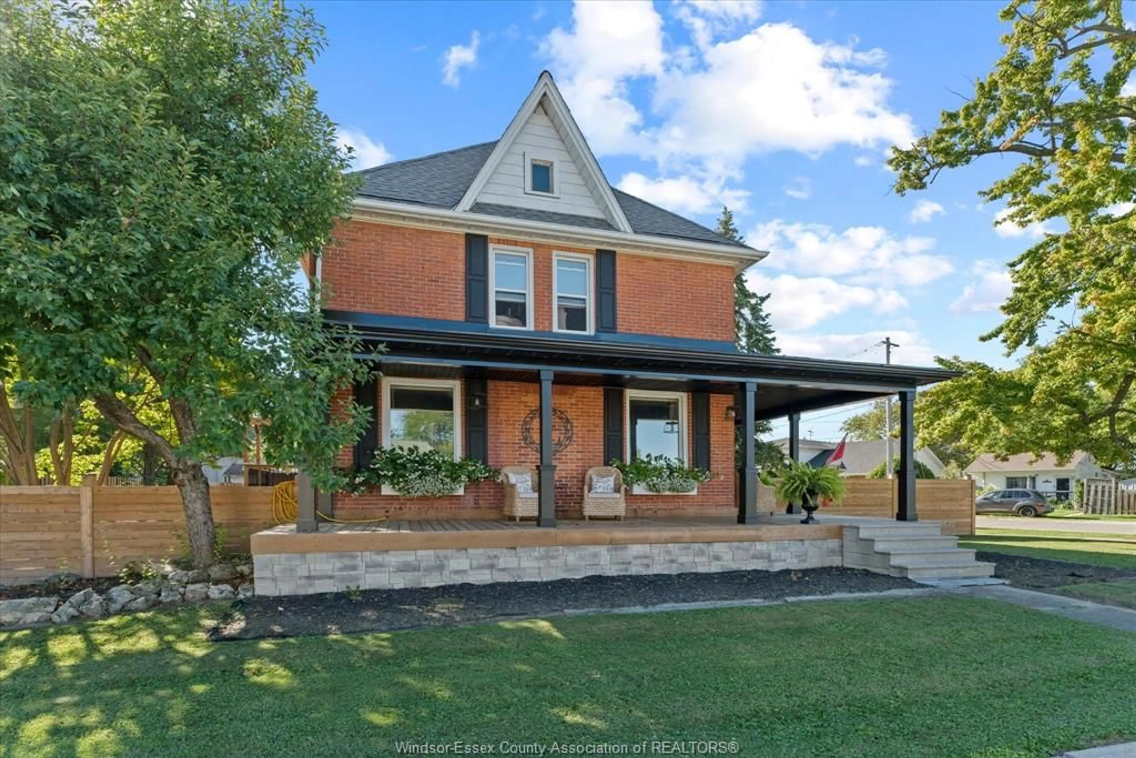 Home with brick exterior material, street for 48 ERIE St, Wheatley Ontario N0P 2P0